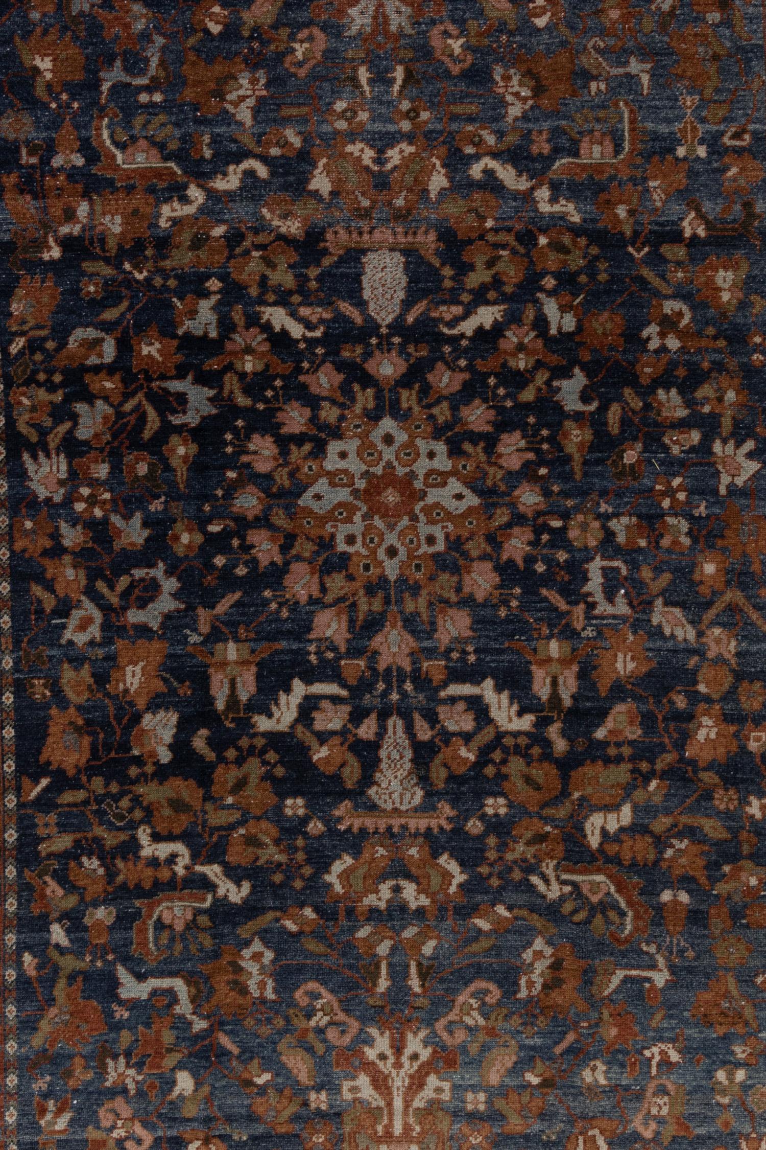Deep blue with abrash, well detailed with an interested motif of foliage bursting in bloom. Excellent condition with a soft pile. 

Wear Guide: 1

Wear Notes: 
Vintage and antique rugs are by nature, pre-loved and may show evidence of their