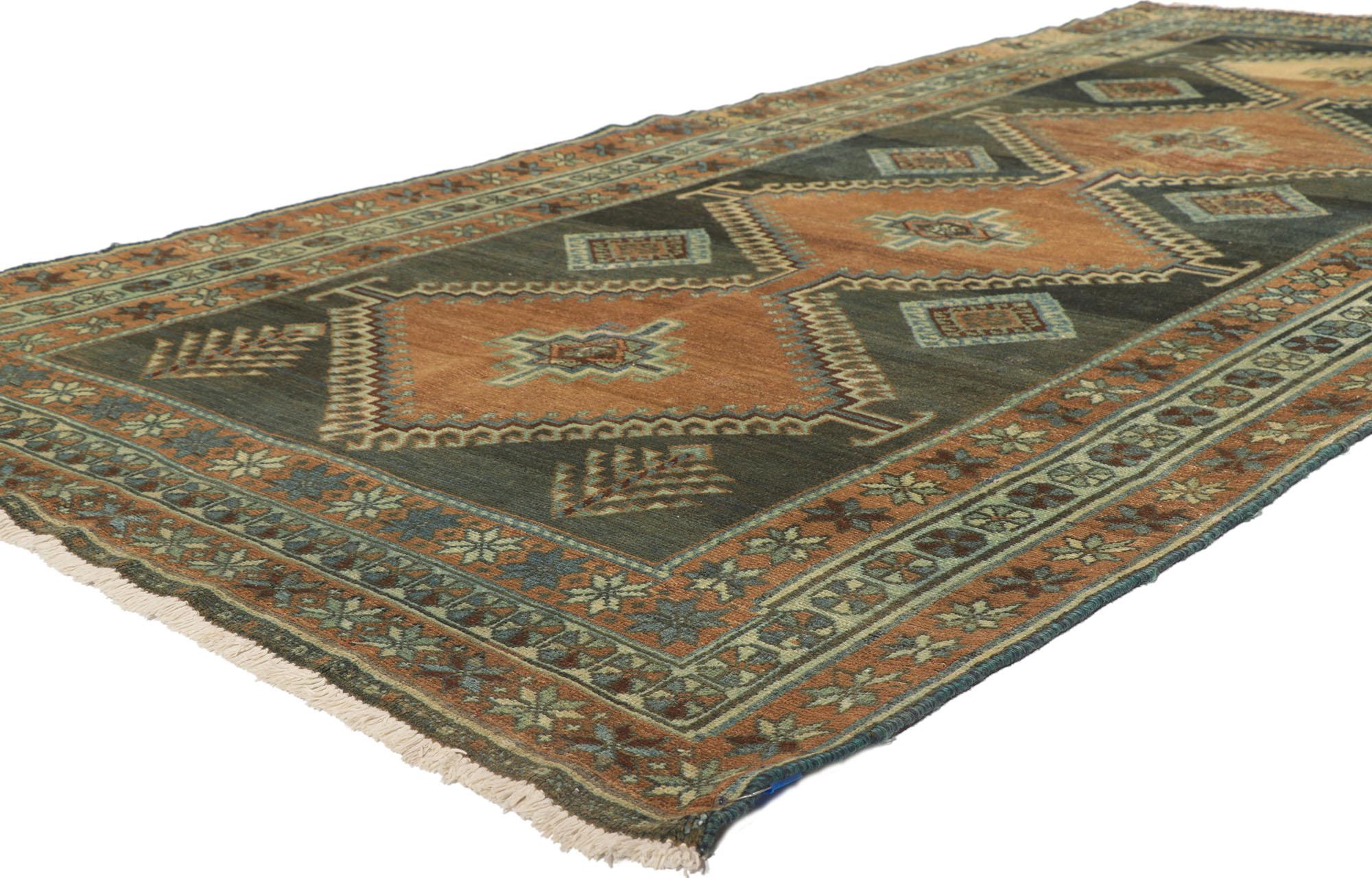 53734 Antique Persian Malayer Rug, 04'08 x 09'01. Infusing a space with traditional sensibility and tribal design elements, this hand-knotted wool distressed antique Persian Malayer gallery rug effortlessly harmonizes with a variety of interior
