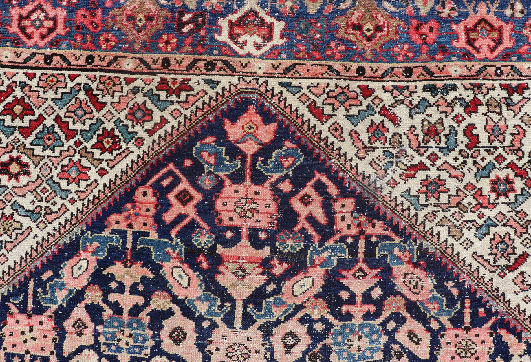 Multicolored antique Persian Malayer gallery rug with geometric Herati motifs, rug EMB-8513-178293, country of origin / type: Iran / Malayer, circa 1910.

This lovely antique Persian distressed Malayer gallery rug originates from the northwest