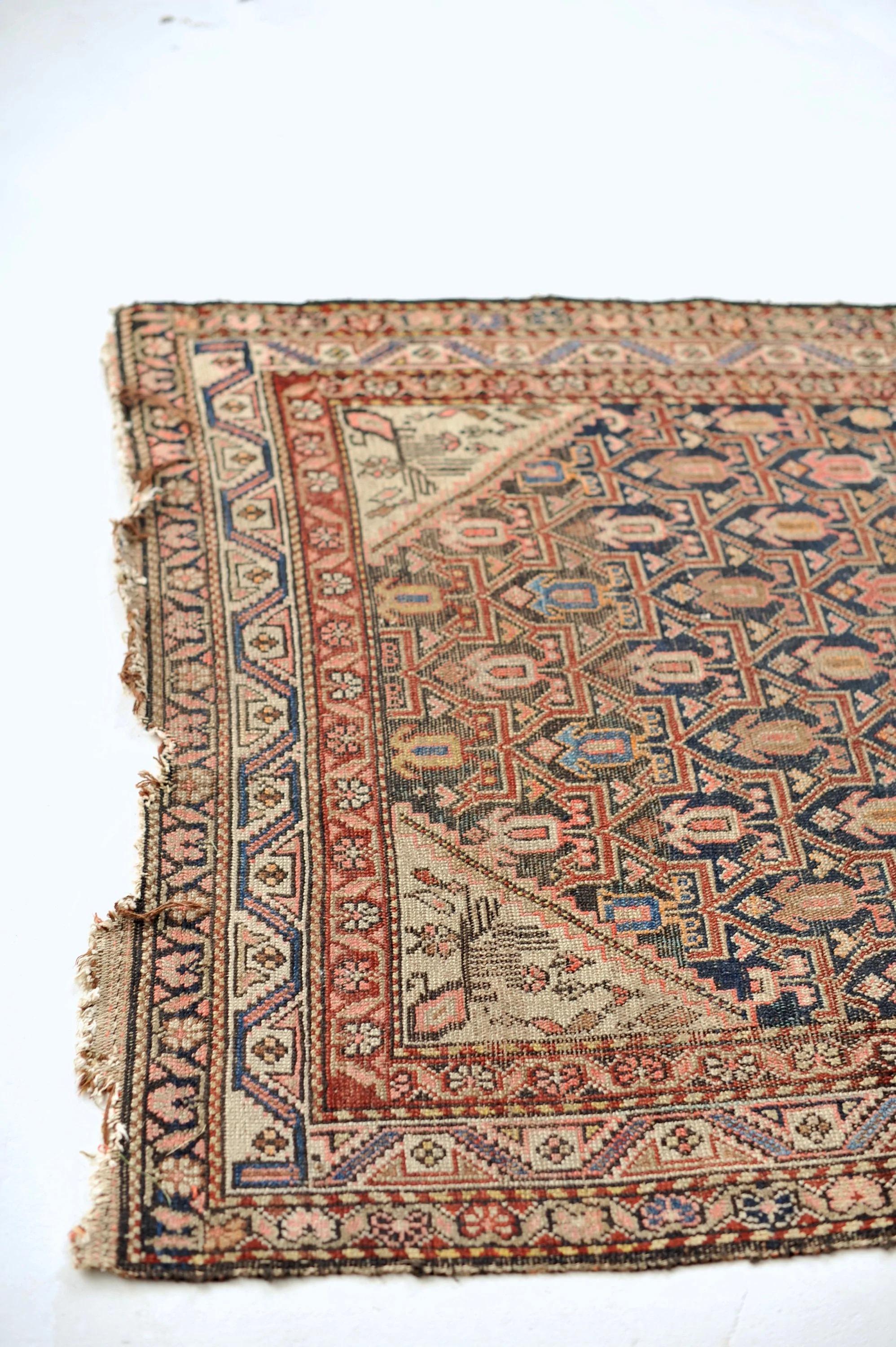 Distressed Antique Persian Malayer

Size: 3.8 x 6.8
Age: Antique
Pile: Low with patina and age-related wear

This rug is one-of-a-kind, only one in the world, no others are available.

Because of the nature and age of these older/antique handmade