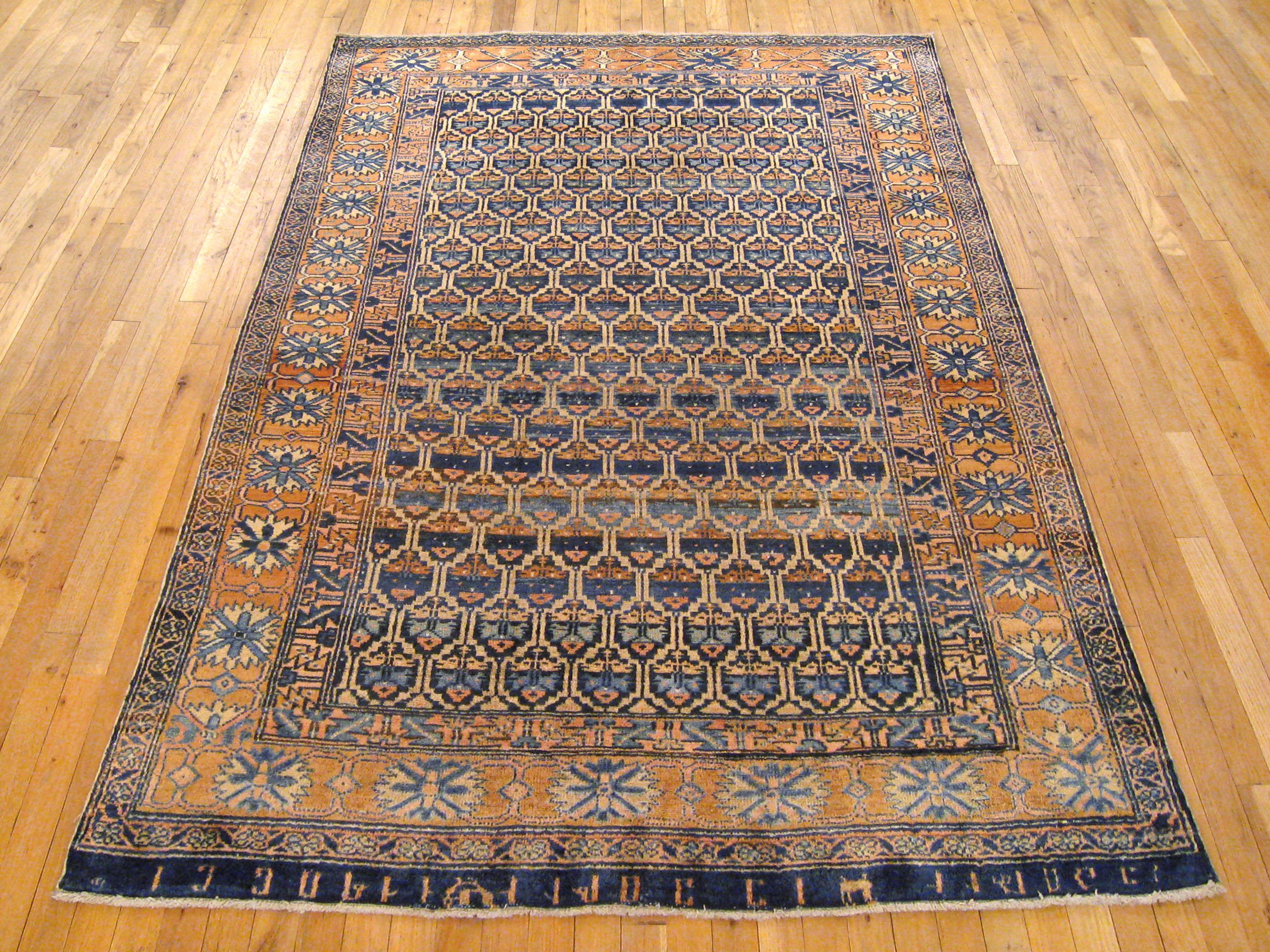 Antique Persian Malayer oriental rug in room size

An antique Persian Malayer oriental rug, circa 1920. Size 6'9