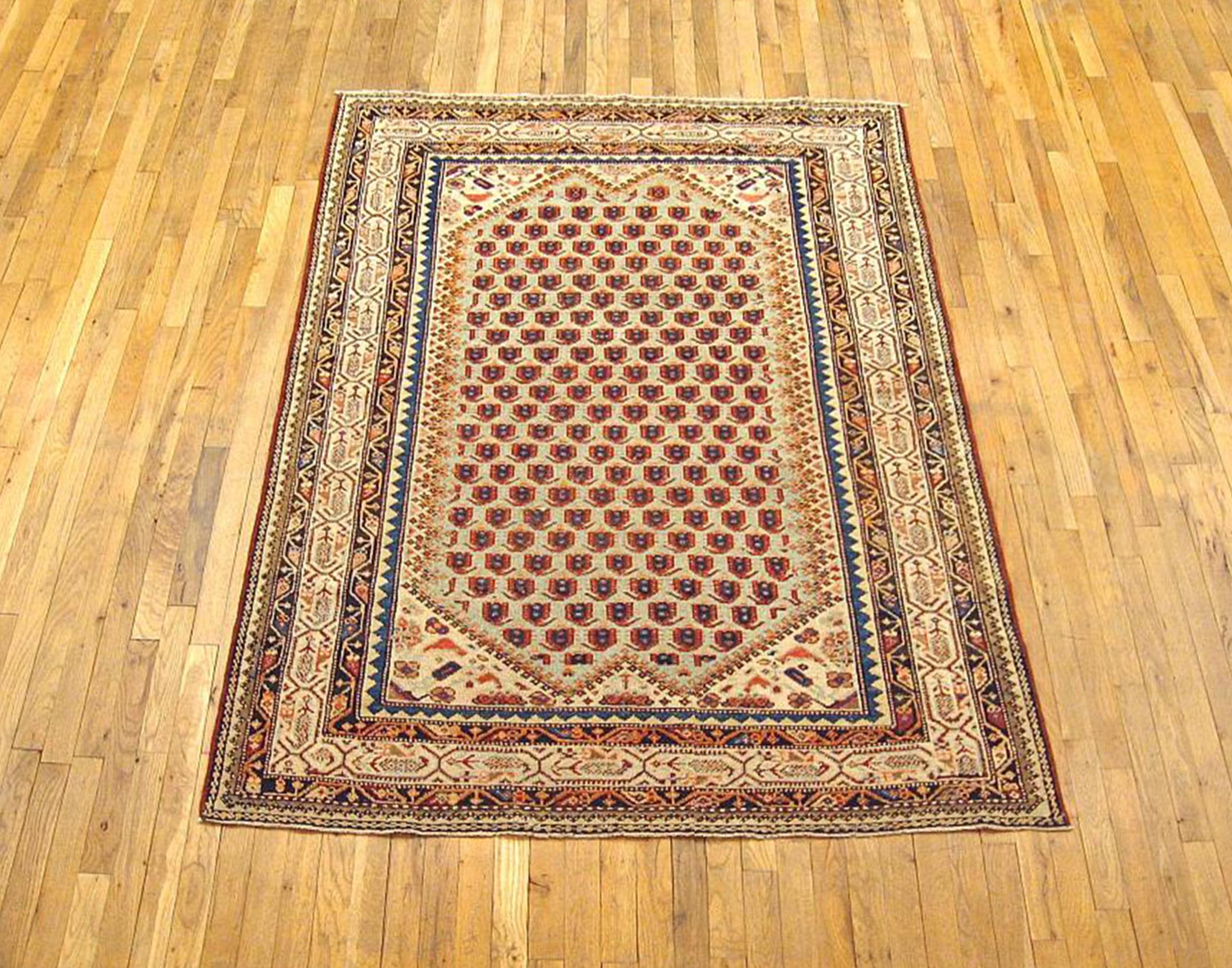 Antique Persian Malayer Oriental Rug in Small Size

An antique Persian Malayer oriental rug, circa 1920. Size 6'4