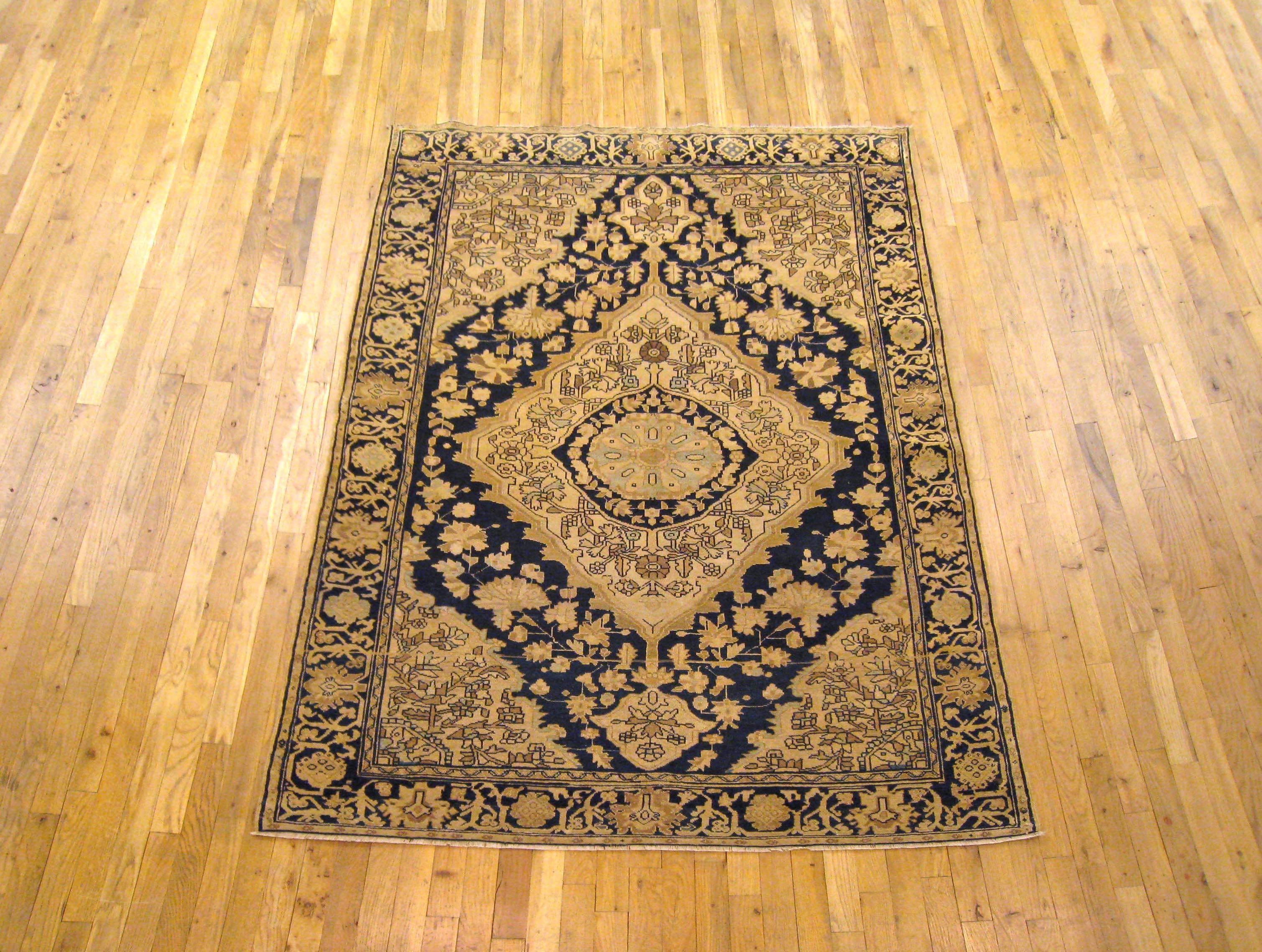 Antique Persian Malayer Oriental Rug in Small Size

An antique Persian Malayer oriental rug, circa 1900. Size 6'6