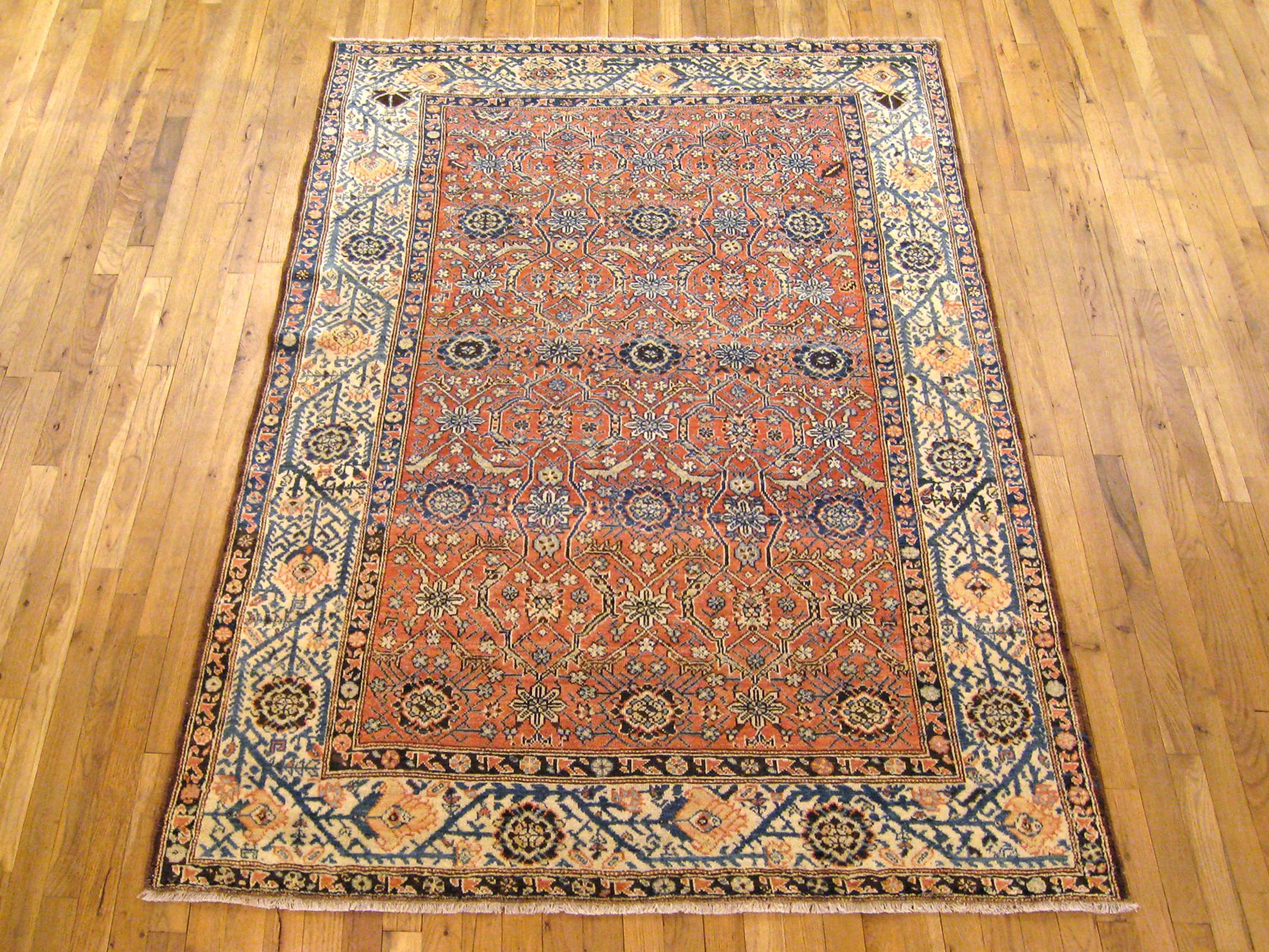 Antique Persian Malayer Oriental Rug in Small Size

An antique Persian Malayer oriental rug, circa 1910. Size 6'3