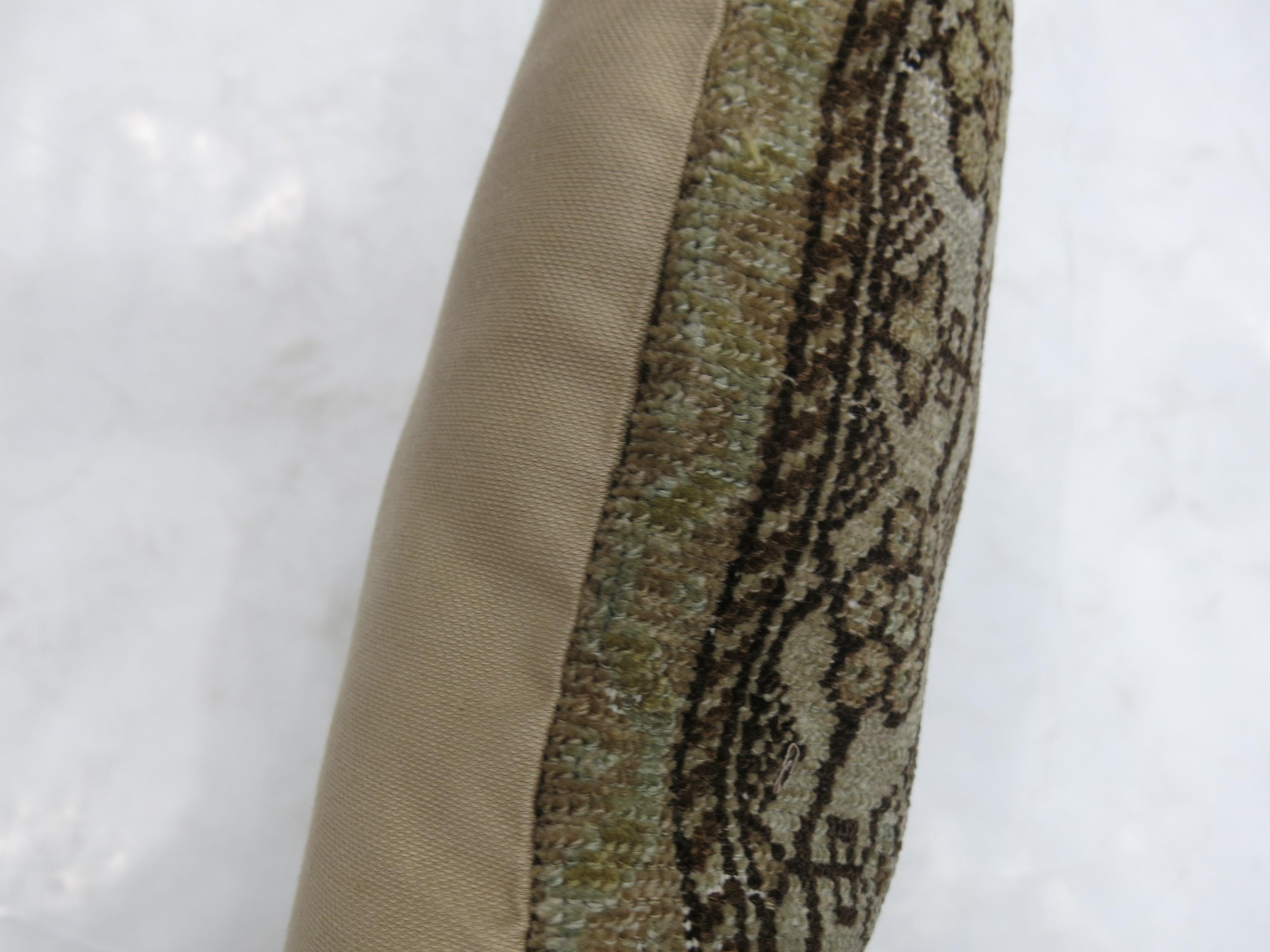Pillow made from an antique Persian Malayer rug in browns and green.

16'' x 16''