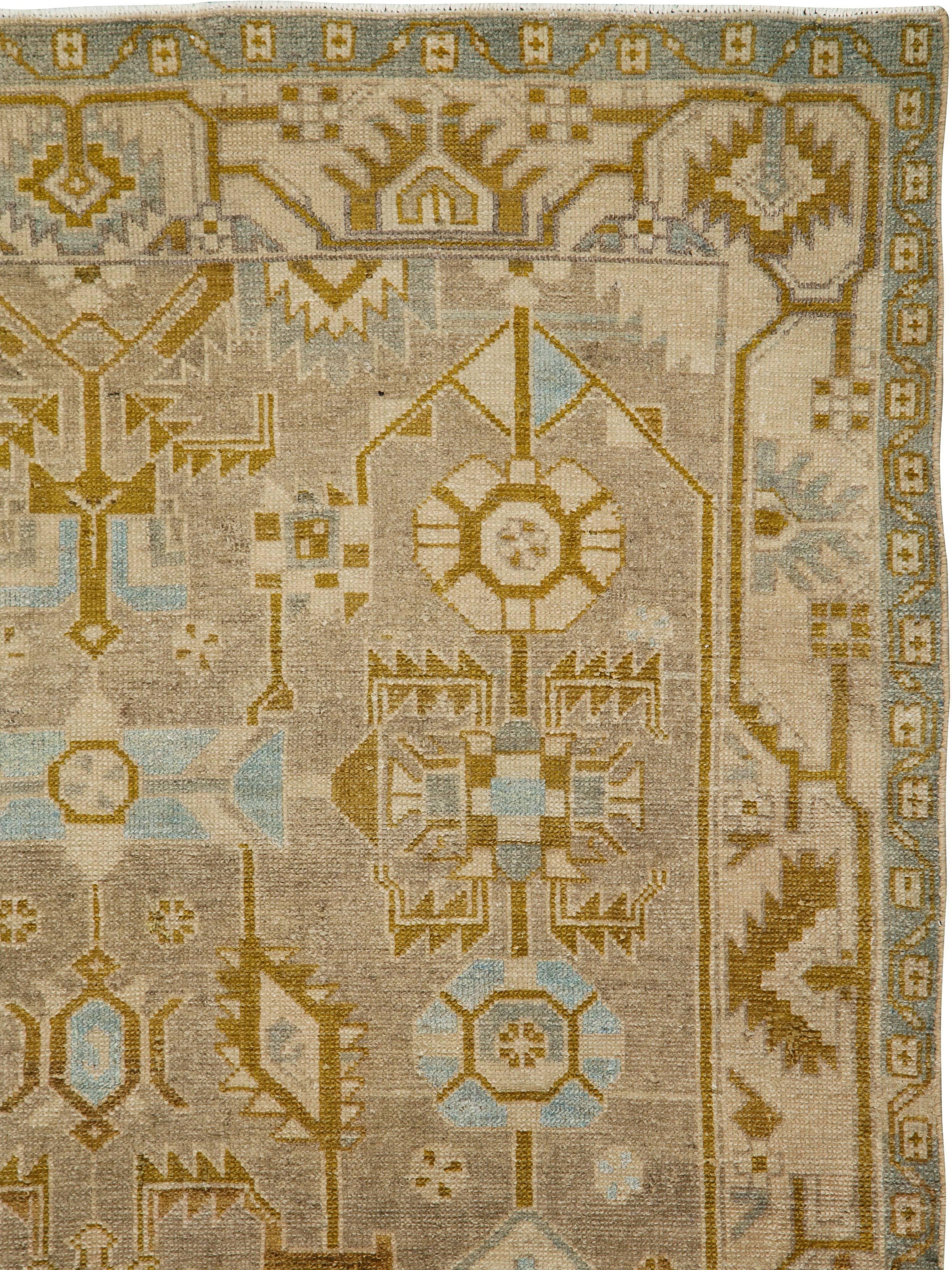 An antique Persian Malayer rug from the early 20th century.