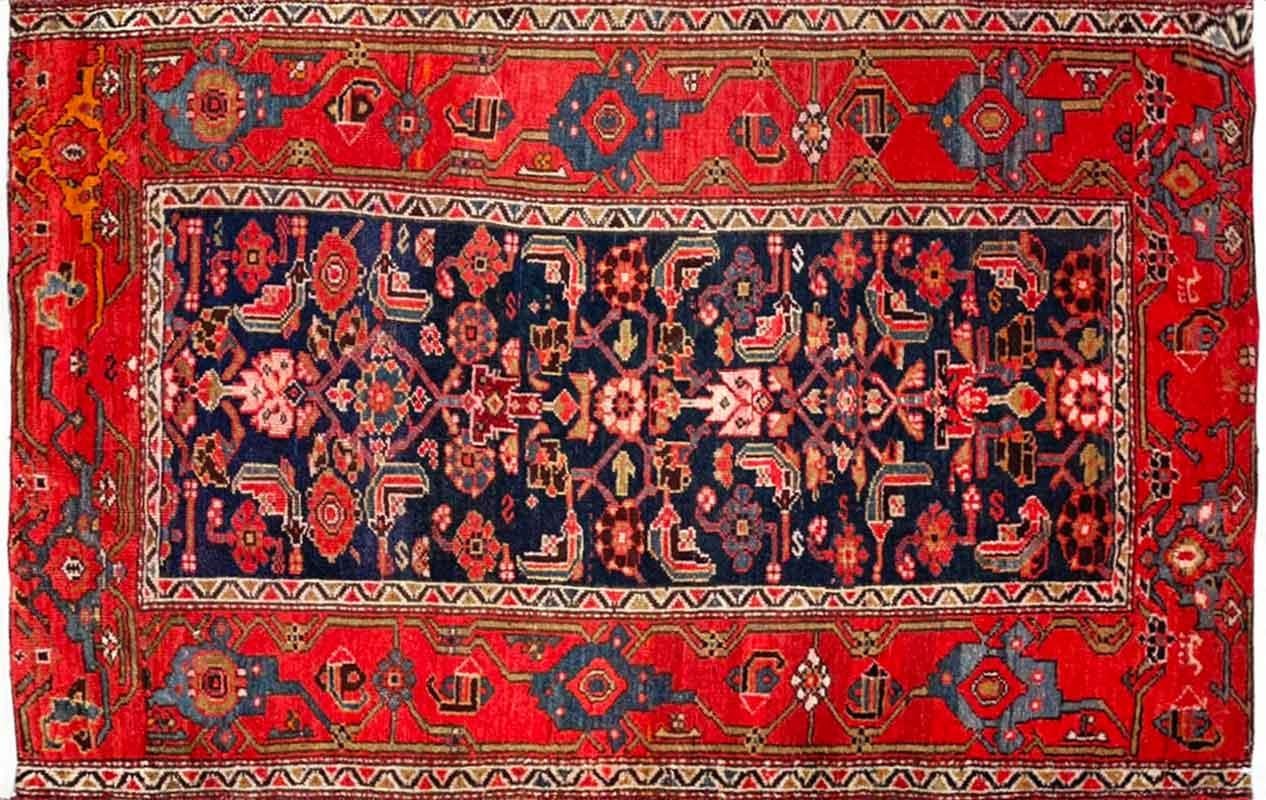 Immerse yourself in the captivating world of Malayer rugs, where Turkish tribal weavers intricately wove tales of artistry. Employing the symmetrical Gourde knot, a hallmark of their craft, these weavers created a distinctive contrast to the