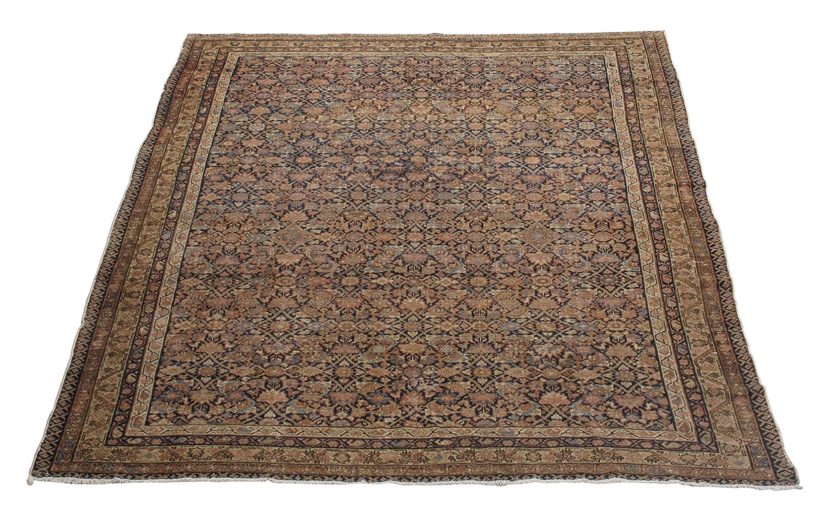 This antique Malayer rug is skillfully sourced by N A S I R I through extensive travel, passion, and research. Malayer rugs are named after a major rug weaving village in central west Iran. The village was known for producing extremely Fine rugs in