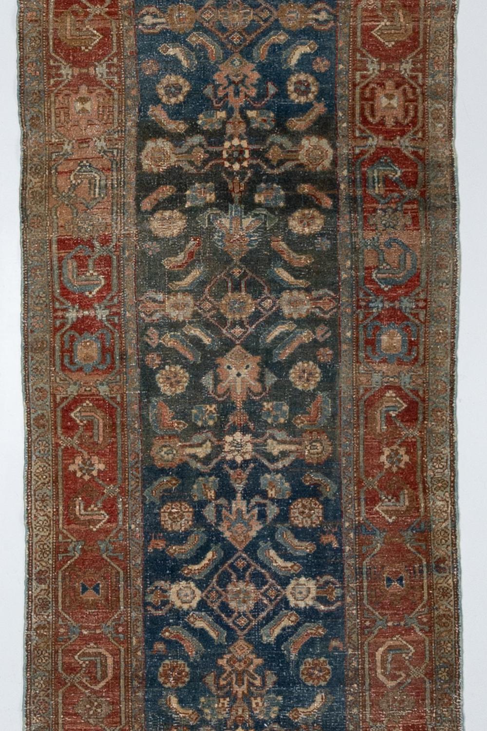 Age: 100 years.

Pile: Low

Wear notes: none

Beautiful abrash that transitions from emerald green to sapphire blue. Excellent condition. 

Wear Notes:
Vintage and antique rugs are by nature, pre-loved and may show evidence of their past.