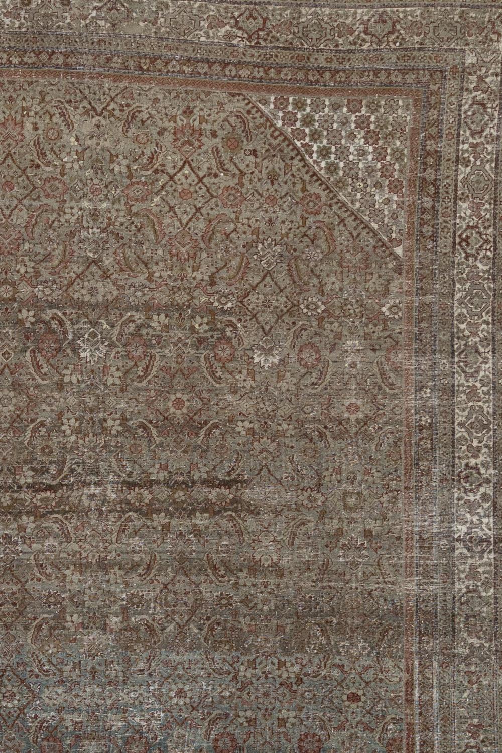 Age: Circa 1910

Colors: dusty pink, terracotta, olive, rust, oxblood

Pile: low-medium

Wear Notes: 3-4

Material: wool on cotton

Antique Persian Malayer with a warm earthy color palette. Very finely woven with an all over herati pattern