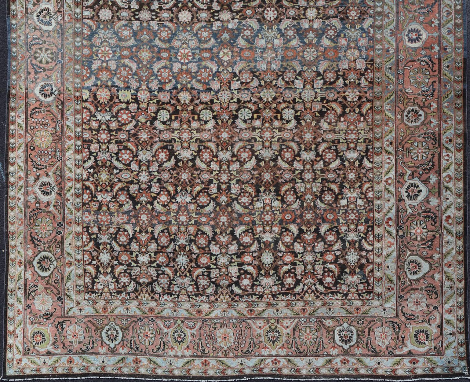 Early 20th century antique Persian Malayer rug in variegated charcoal, brown, green and blue background and salmon border
A very fine antique Persian Malayer rug with all-over design Keivan Woven Arts/rug R20-0102, country of origin / type: Iran /