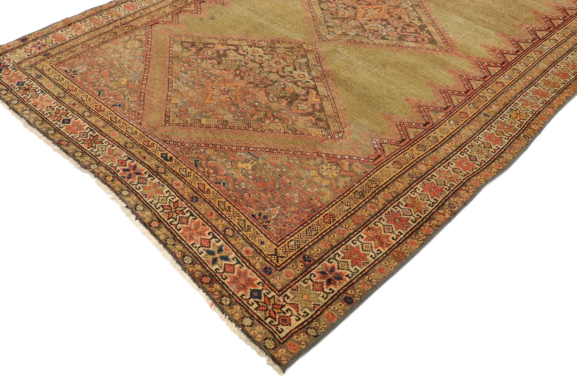 53062 antique Persian Malayer runner with rustic Mediterranean style 04'01 x 09'01. This hand knotted wool and camel hair antique Persian Malayer runner features five diamond-shaped medallions spread across an abrashed camel colored field. The