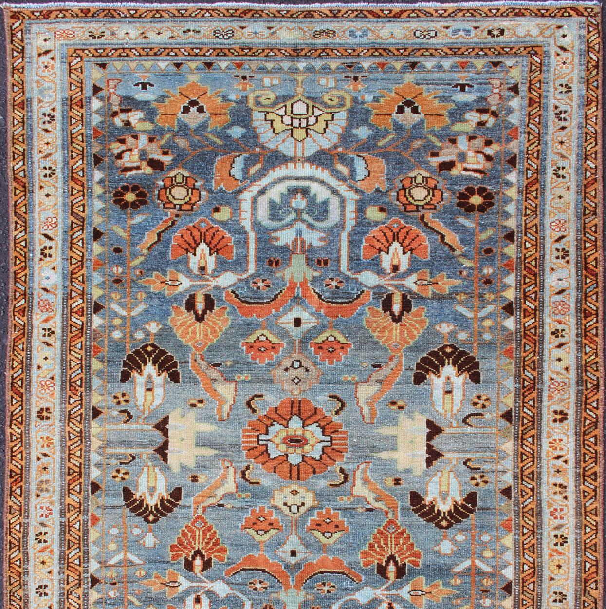 Antique Persian Malayer Rug with a Blue Field and Stylized Floral Design In Good Condition For Sale In Atlanta, GA