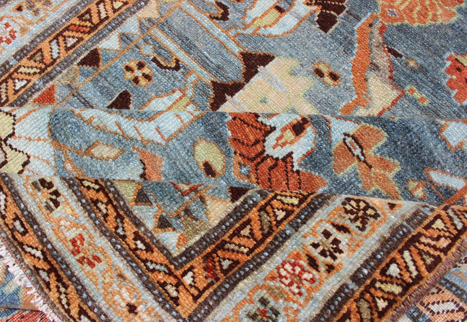 20th Century Antique Persian Malayer Rug with a Blue Field and Stylized Floral Design For Sale