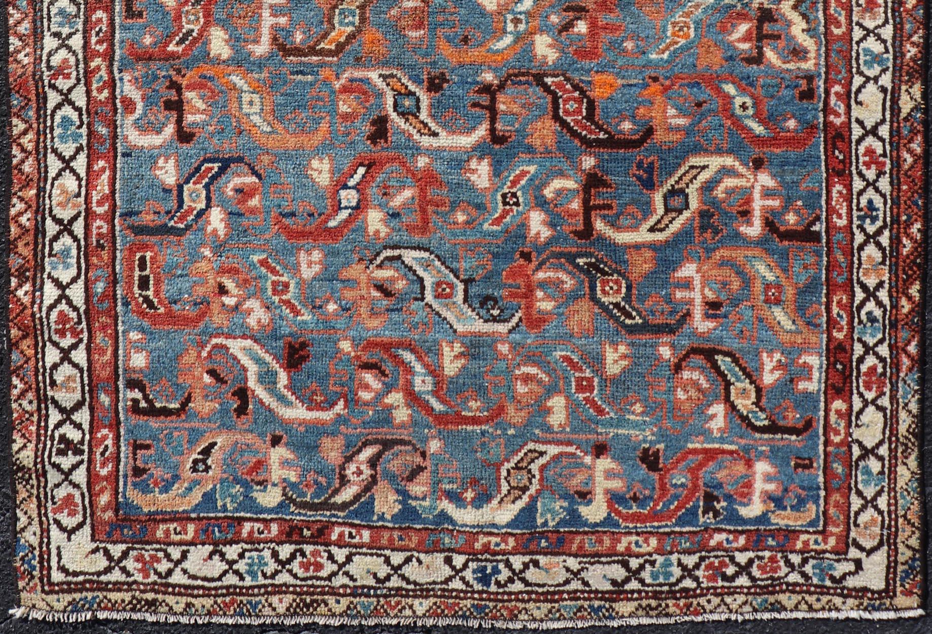 Antique Persian Malayer rug with blue field and tribal motif design, Keivan Woven Arts / rug/EMB-9716-P13895, country of origin / type: Iran / Malayer, circa 1920.


Measures: 3'7 x 5'2.