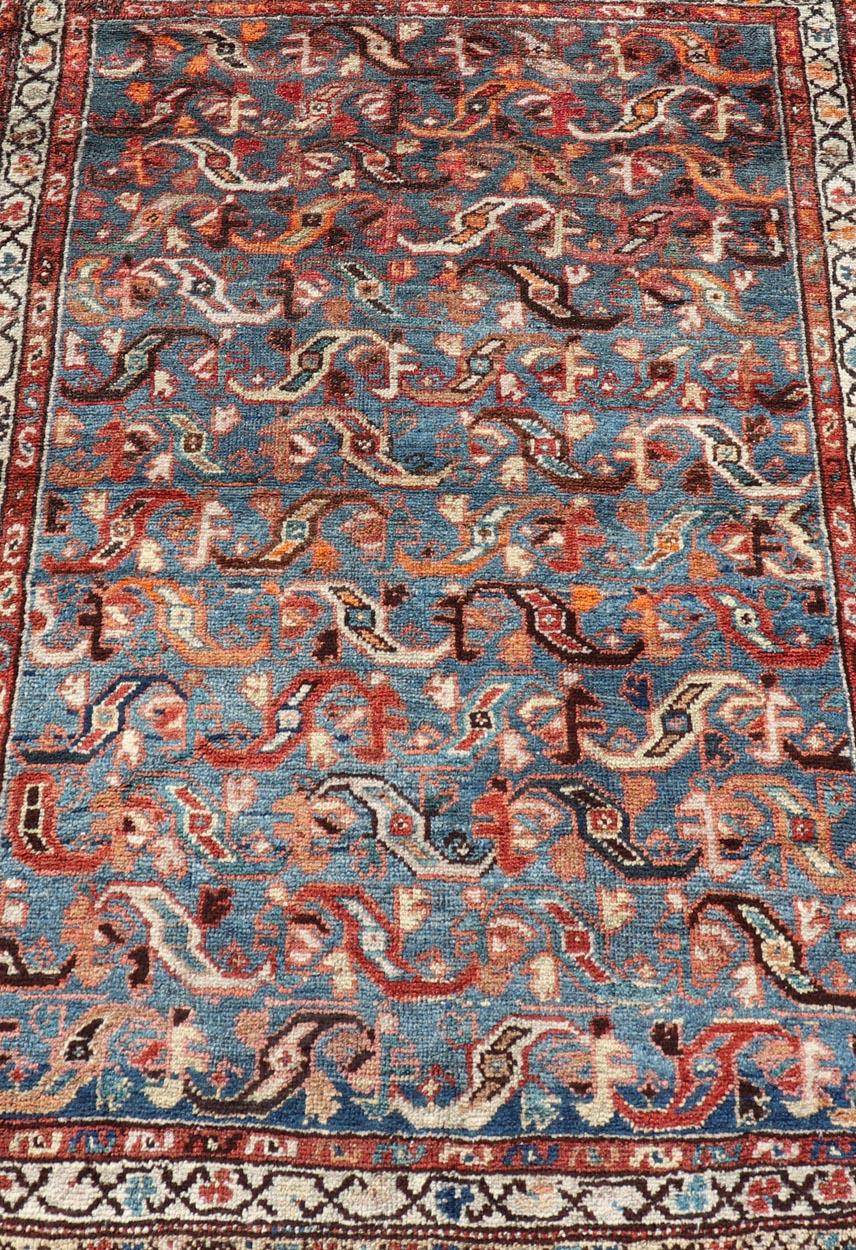 Hand-Knotted Antique Persian Malayer Rug with a Blue Field and Stylized Tribal Design For Sale