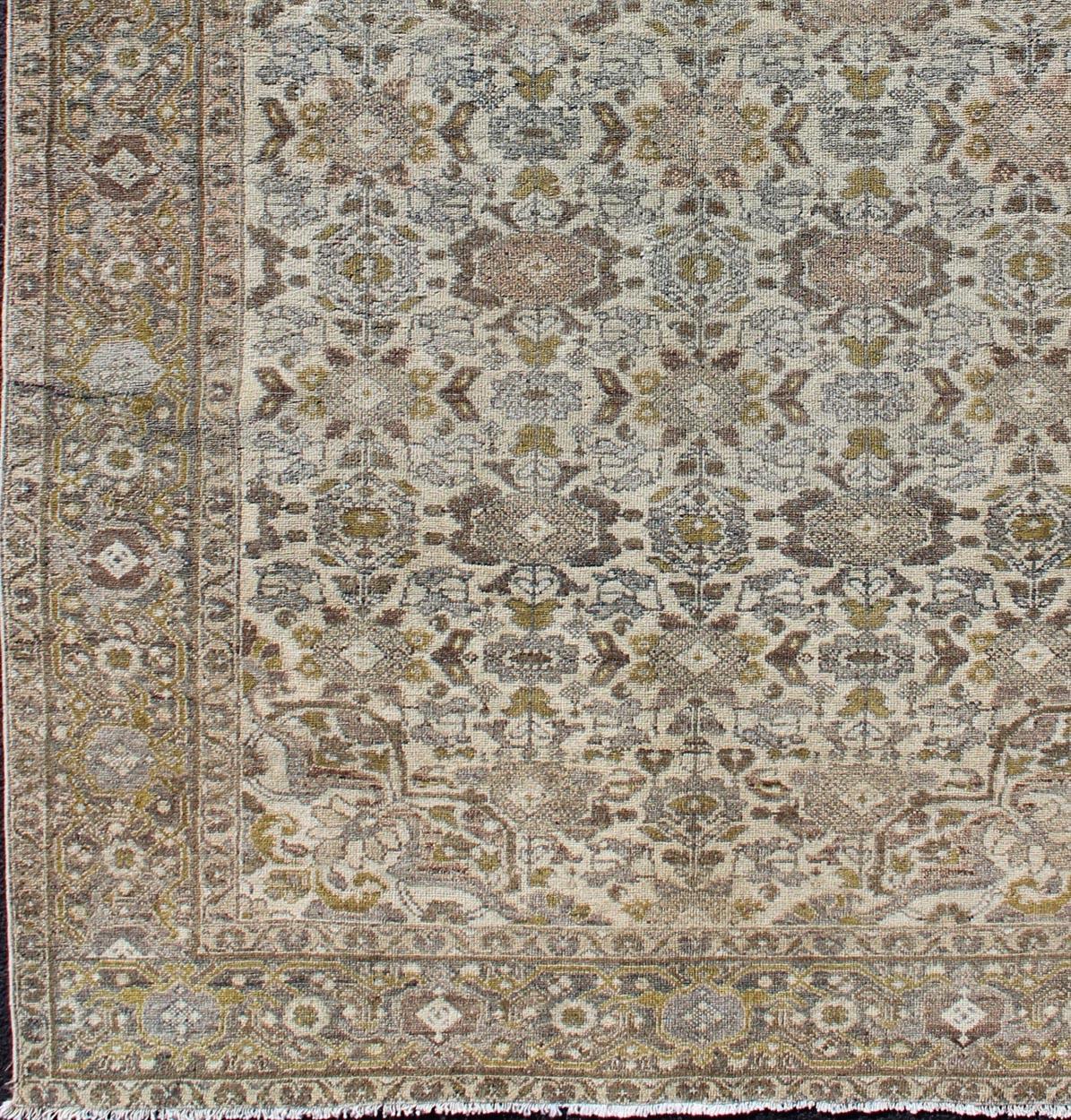 Earth tone Boteh design Persian Malayer antique rug, rug 18-0401, country of origin / type: Iran / Malayer, circa 1910

This antique Persian Malayer rug, circa early 20th century, relies heavily on exquisite details as well as a small-scale