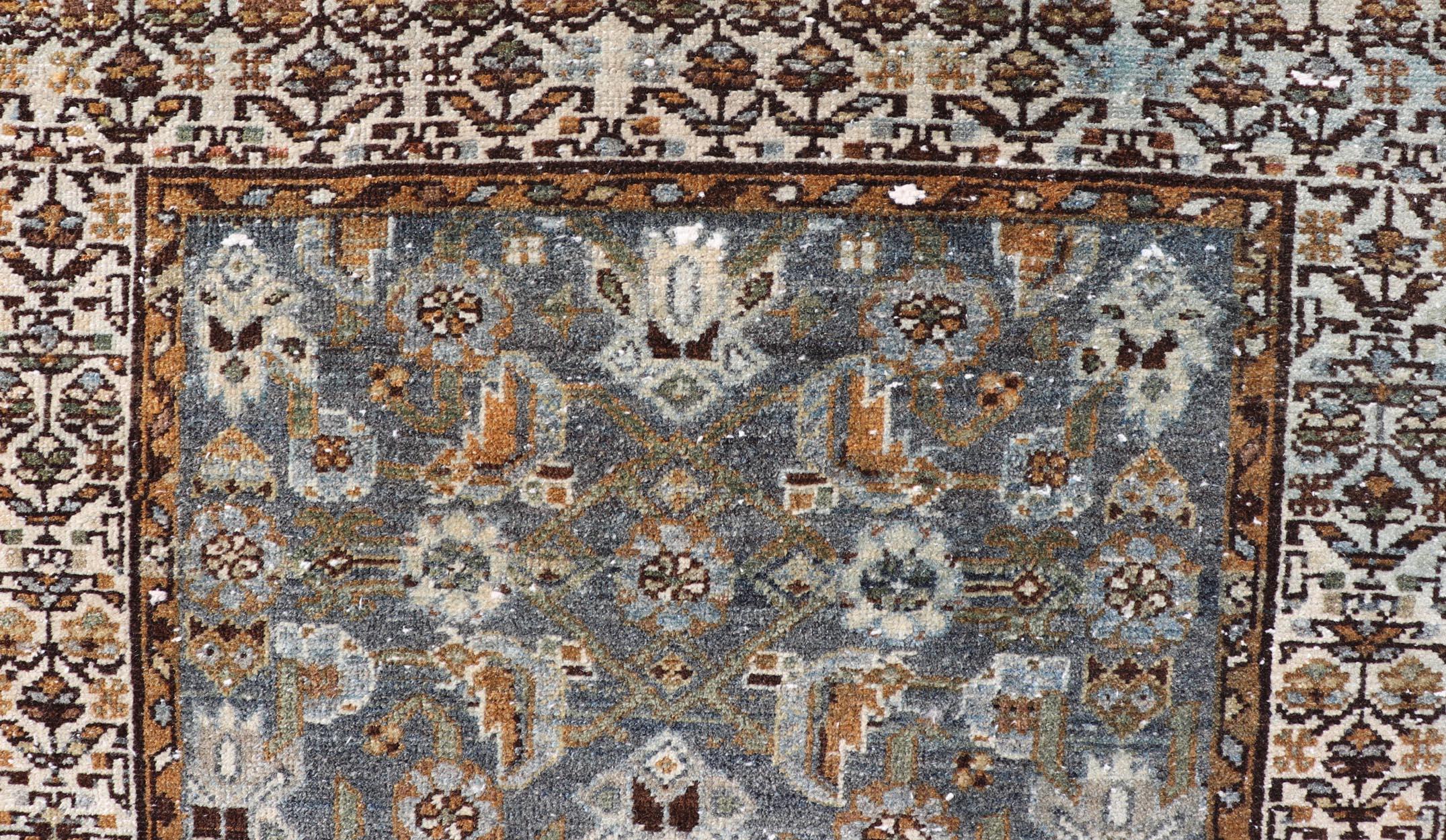 Antique Persian Malayer Rug with All-Over Tribal Design On A Blue Field. Keivan Woven Arts / rug V21-1207, country of origin / type: Iran / Malayer, circa 1910.
Measures: 2'7 x 4'6 
This antique Persian Malayer rug, circa early 20th century, relies