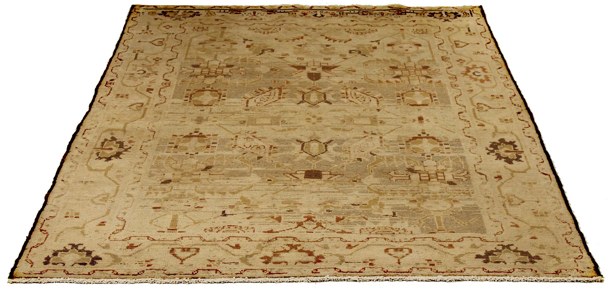 Antique Persian runner rug handwoven from the finest sheep’s wool and colored with all-natural vegetable dyes that are safe for humans and pets. It’s a traditional Malayer design featuring beige and brown tribal details over an ivory field. It’s a