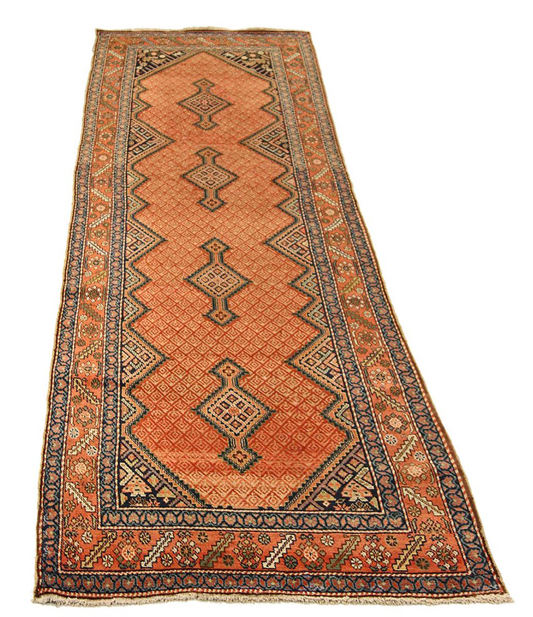 Antique Persian rug handwoven from the finest sheep’s wool and colored with all-natural vegetable dyes that are safe for humans and pets. It’s a traditional Malayer design featuring a beautiful combination of geometric and floral details in black