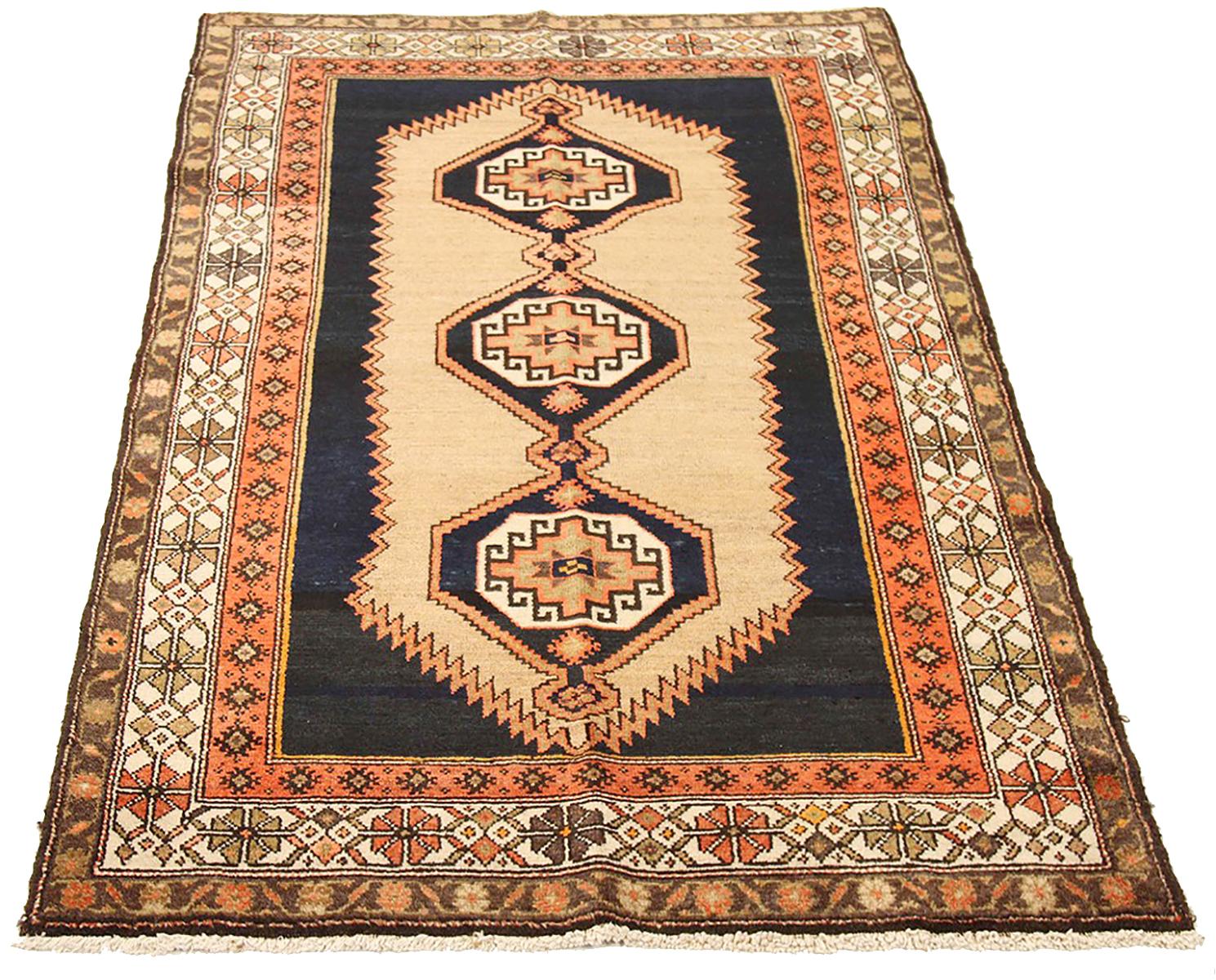 Antique Persian rug handwoven from the finest sheep’s wool and colored with all-natural vegetable dyes that are safe for humans and pets. It’s a traditional Malayer design featuring a beautiful combination of geometric details in black and beige