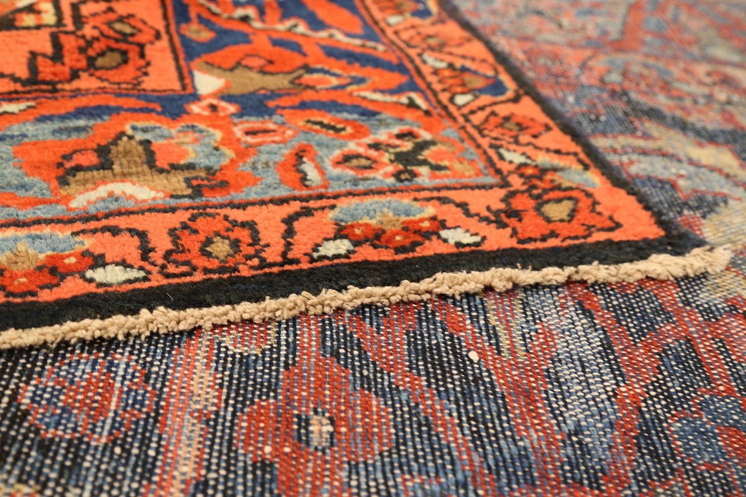 Hand-Woven Antique Persian Malayer Rug with Blue and Red Floral Details on Ivory Field For Sale