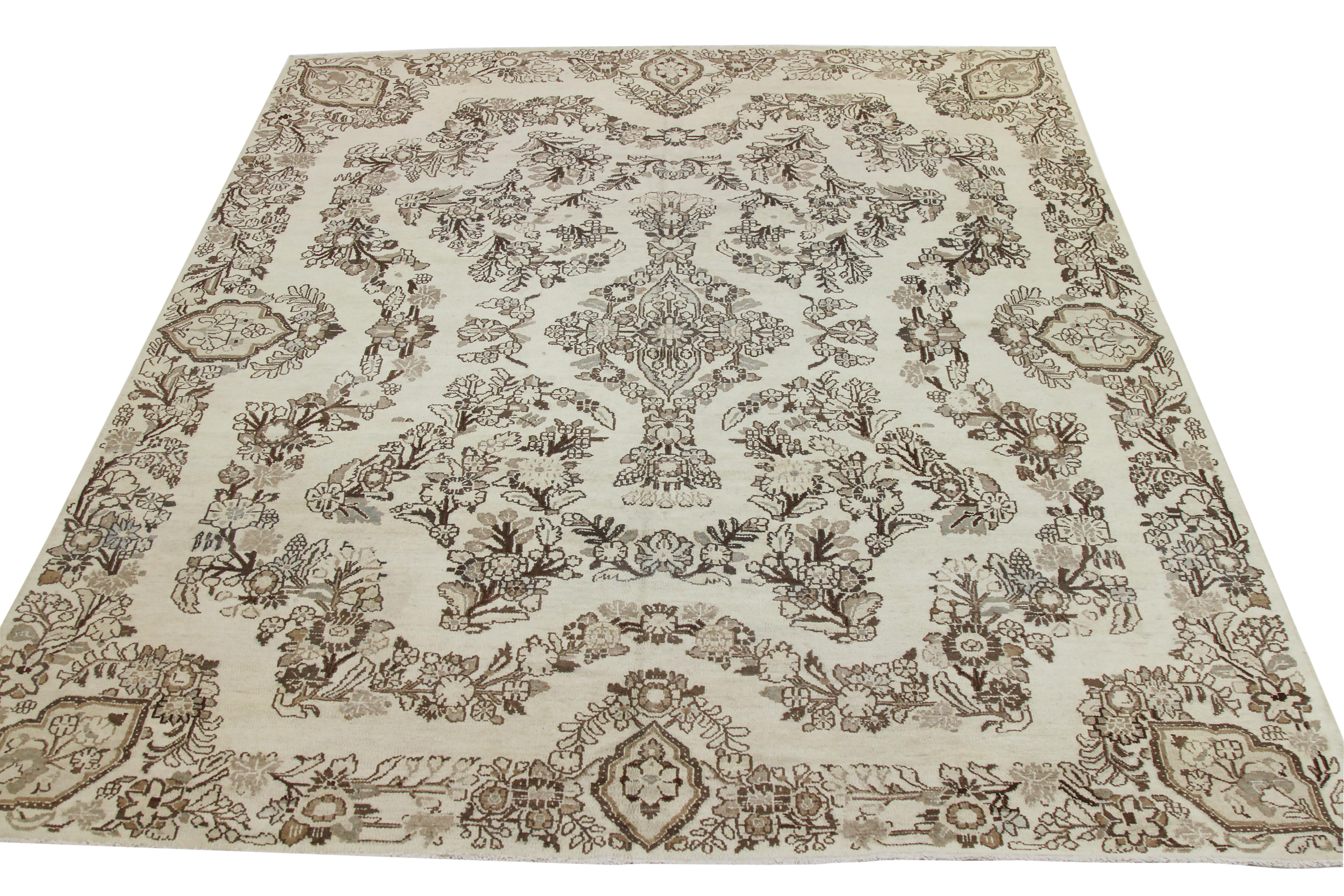 Antique Persian area rug handwoven from the finest sheep’s wool. It’s colored with all-natural vegetable dyes that are safe for humans and pets. It’s a traditional Malayer design in a botanical design on an ivory field. It’s a lovely piece to