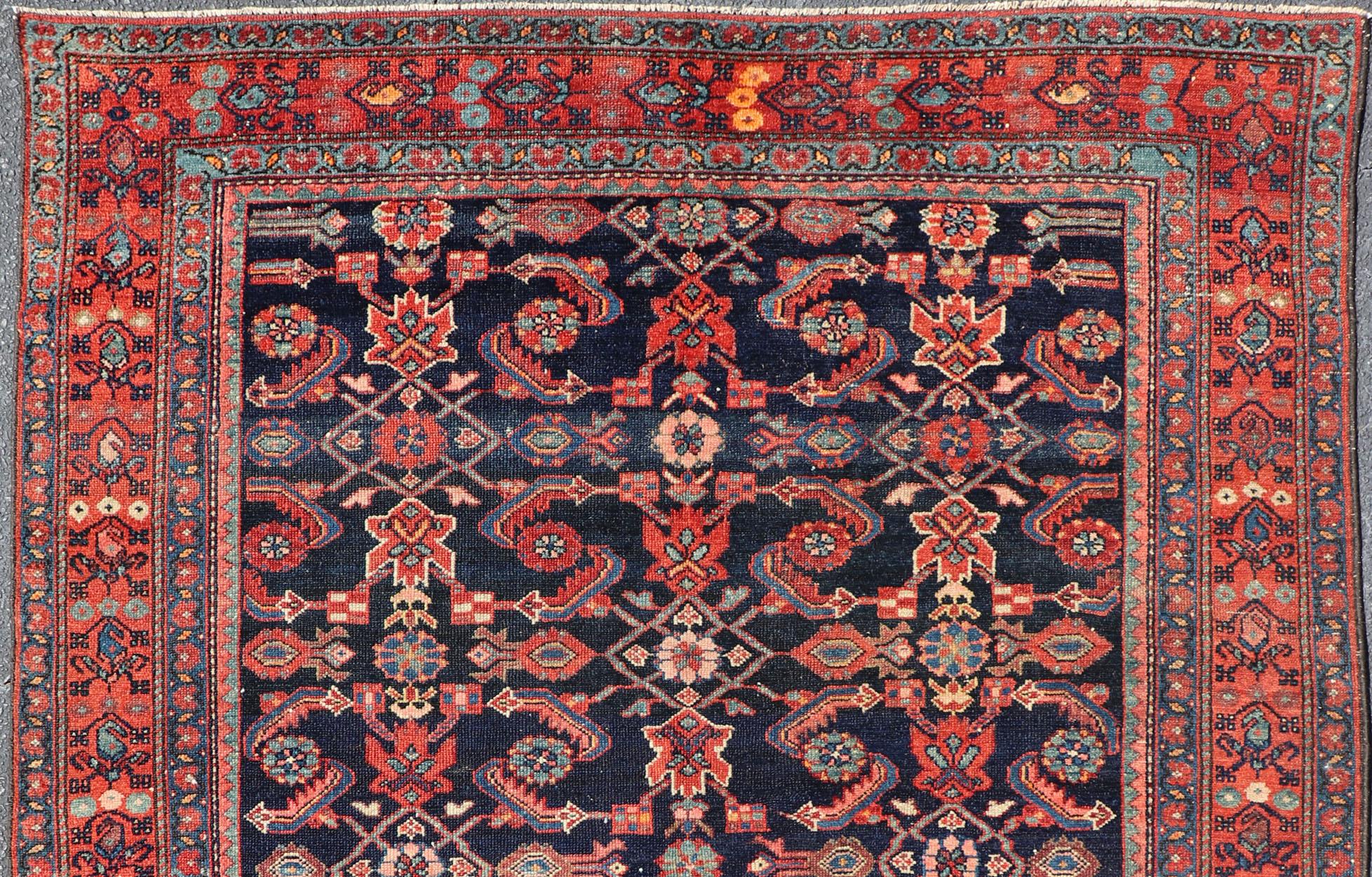 Antique Persian Malayer rug in rich blue and red colors with geometric all over design design, rug V21-0302, country of origin / type: Iran / Malayer, circa 1910.

This antique Persian Malayer rug (circa early 20th century) features a unique blend
