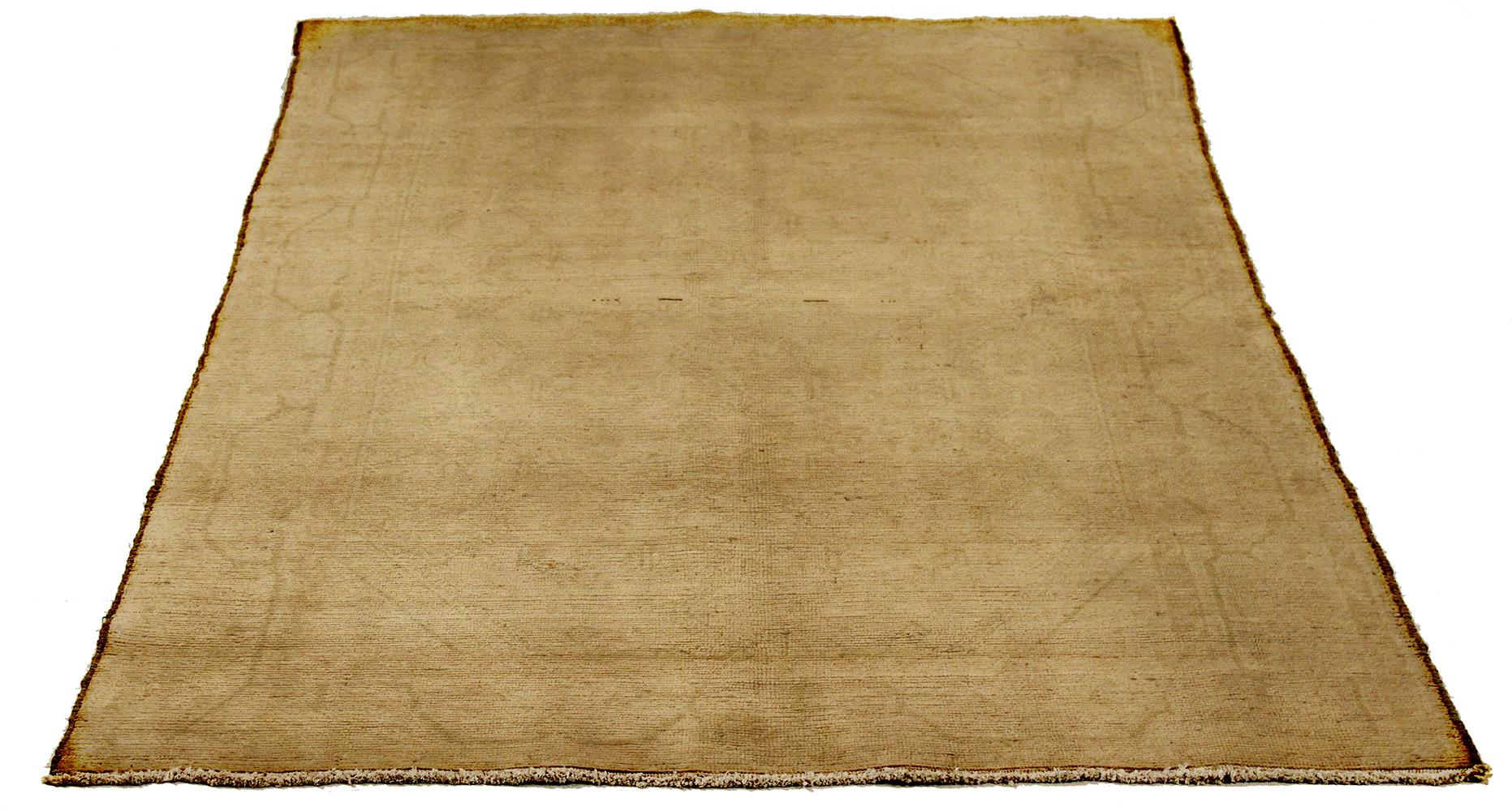 Antique Persian runner rug handwoven from the finest sheep’s wool and colored with all-natural vegetable dyes that are safe for humans and pets. It’s a traditional Malayer design featuring faded botanical details over an ivory field. It’s a lovely