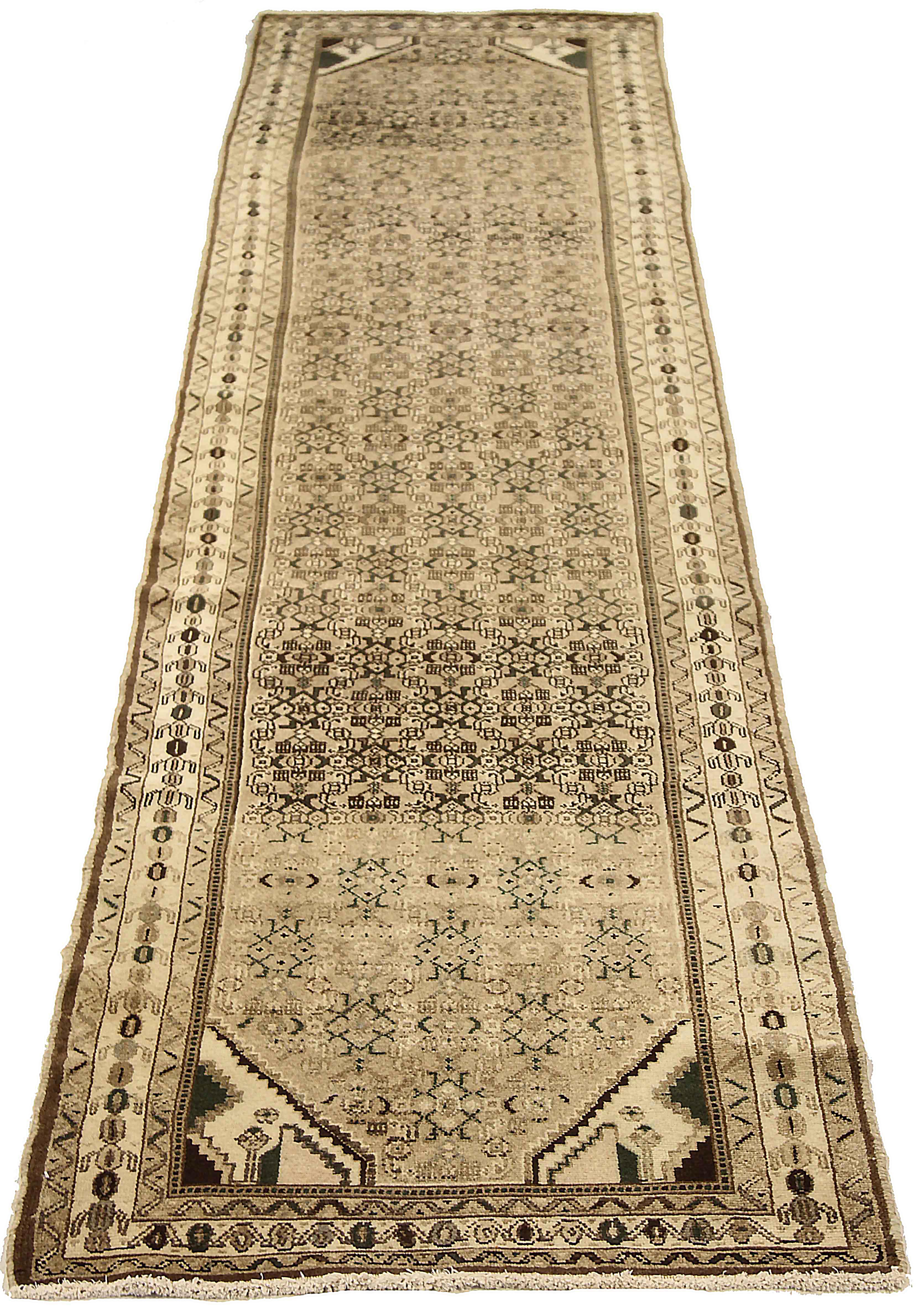 Antique Persian rug handwoven from the finest sheep’s wool. It’s colored with all-natural vegetable dyes that are safe for humans and pets. It’s a traditional Malayer design featuring floral details on an ivory field. It’s a lovely piece to showcase