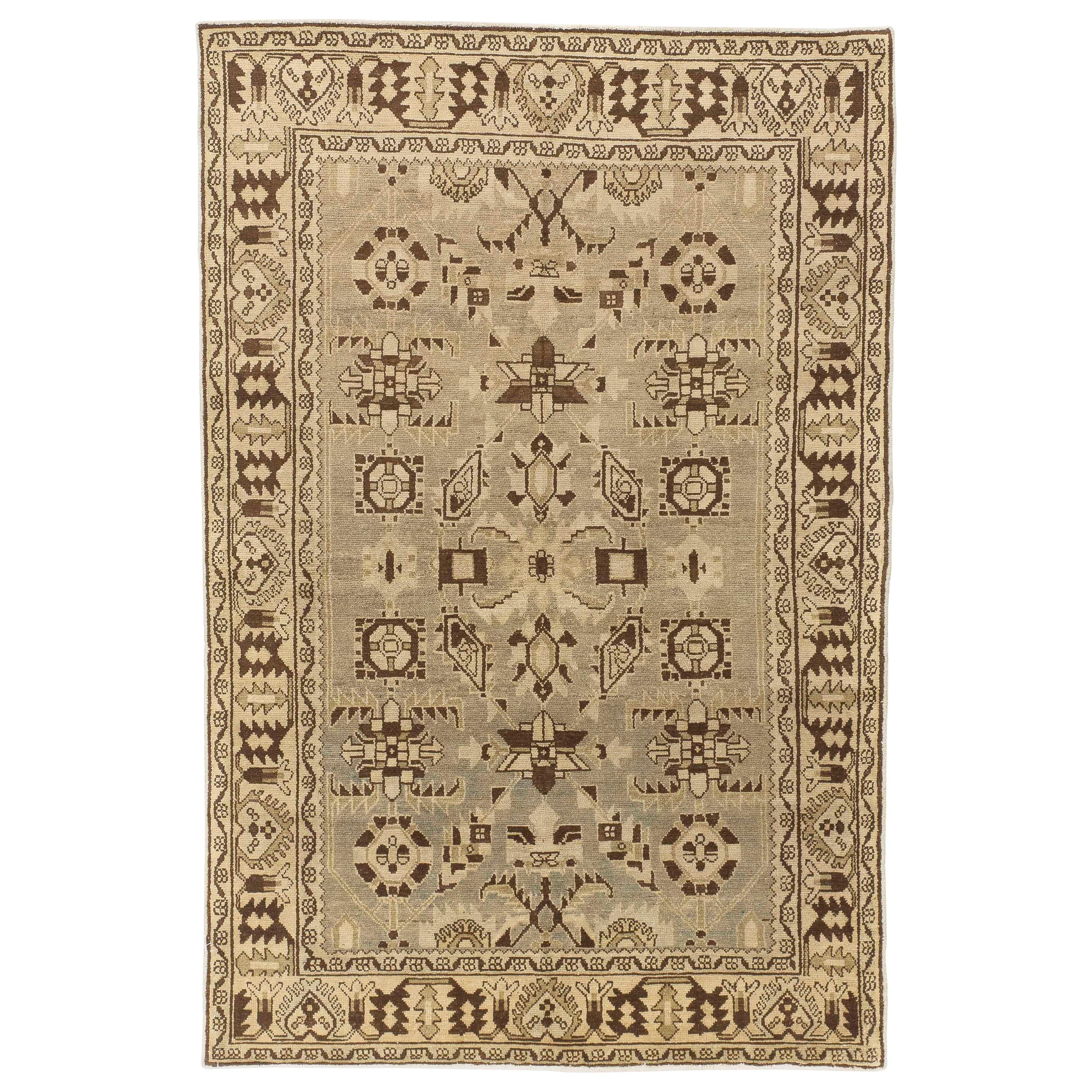 Antique Persian Malayer Rug with Ivory and Brown Tribal Details on Beige Field For Sale
