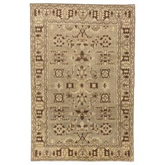 Antique Persian Malayer Rug with Ivory and Brown Tribal Details on Beige Field