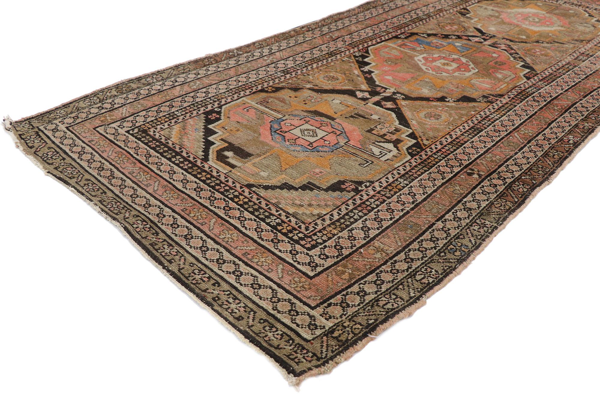 77653 antique Persian Malayer rug with Mid-Century Modern Bohemian style. Warm and inviting with bohemian style, this hand-knotted wool antique Persian Malayer rug features three stepped guls surrounded by a variety of ambiguous tribal motifs. It is
