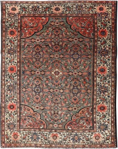 Antique Persian Malayer Rug with Teal Field and Coral Spandrel Design