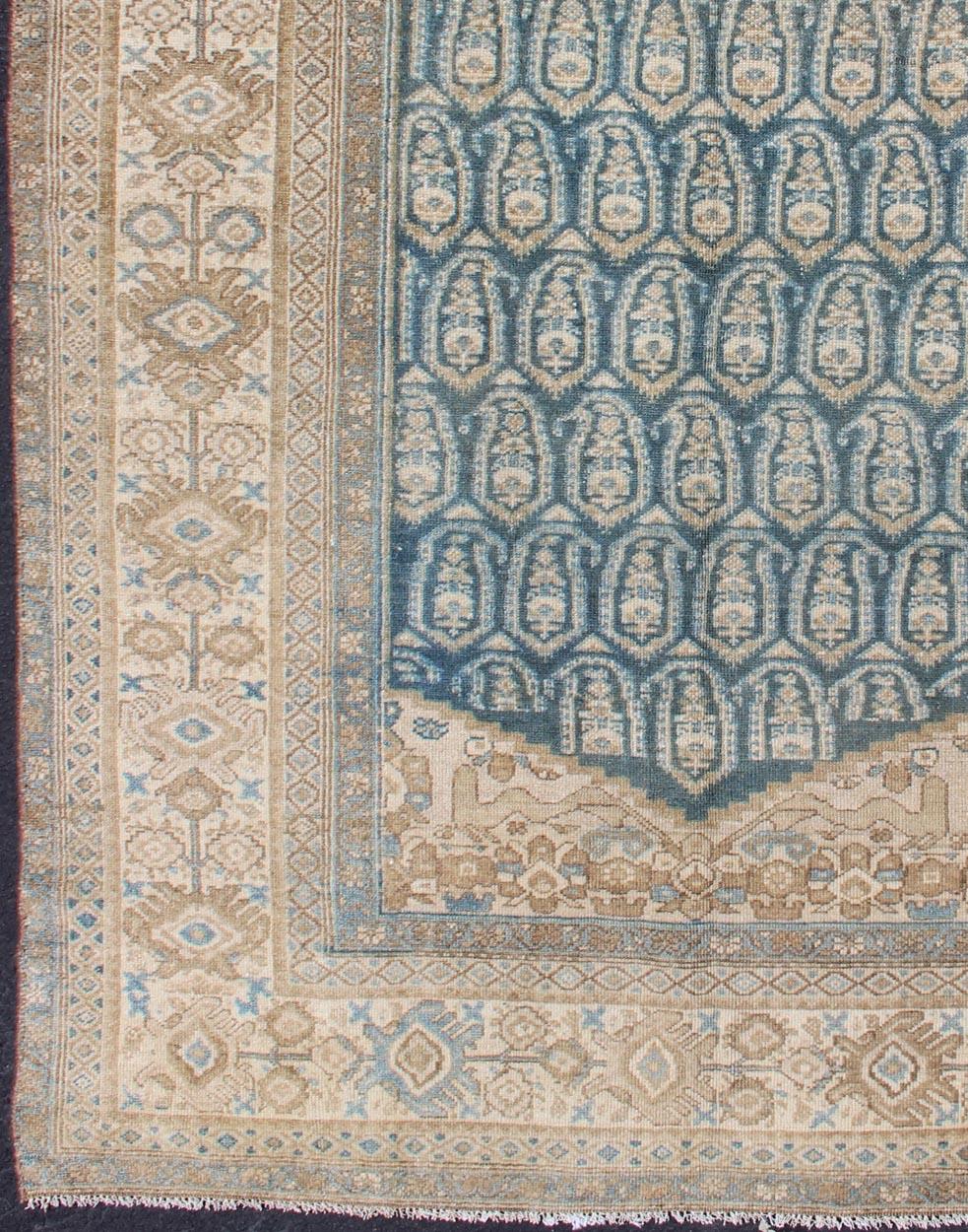 Antique Malayer rug from Persia in Taupe, nude, and Aegean blue, rug 19-0104, country of origin / type: Iran / Malayer, circa 1900.

This beautiful antique Malayer rug from Persia features an expansive all-over design. The central field of repeating