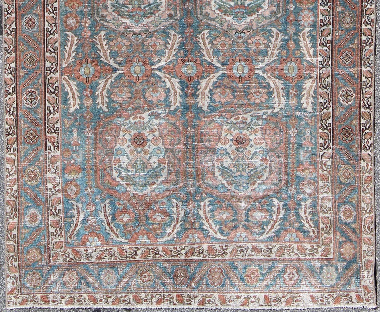 Antique Persian Malayer rug with vertical medallions in blue, ivory and salmon, Keivan Woven Arts/ rug/ sus-1803-149, country of origin / type: Iran / Malayer, circa 1910.

Measures: 5'2 x 11'4.

This rare antique Malayer runner from the early 20th