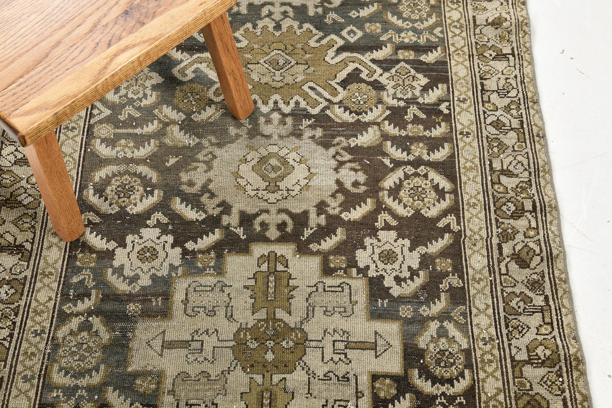 Glamorous and timeless, this brown and gold antique Persian Malayer rug is the ideal piece to grace your presence. Give your home a modern twist by implementing a wall treatment with this rug, sold exclusively at Los Angeles rugs dealer, Mehraban
