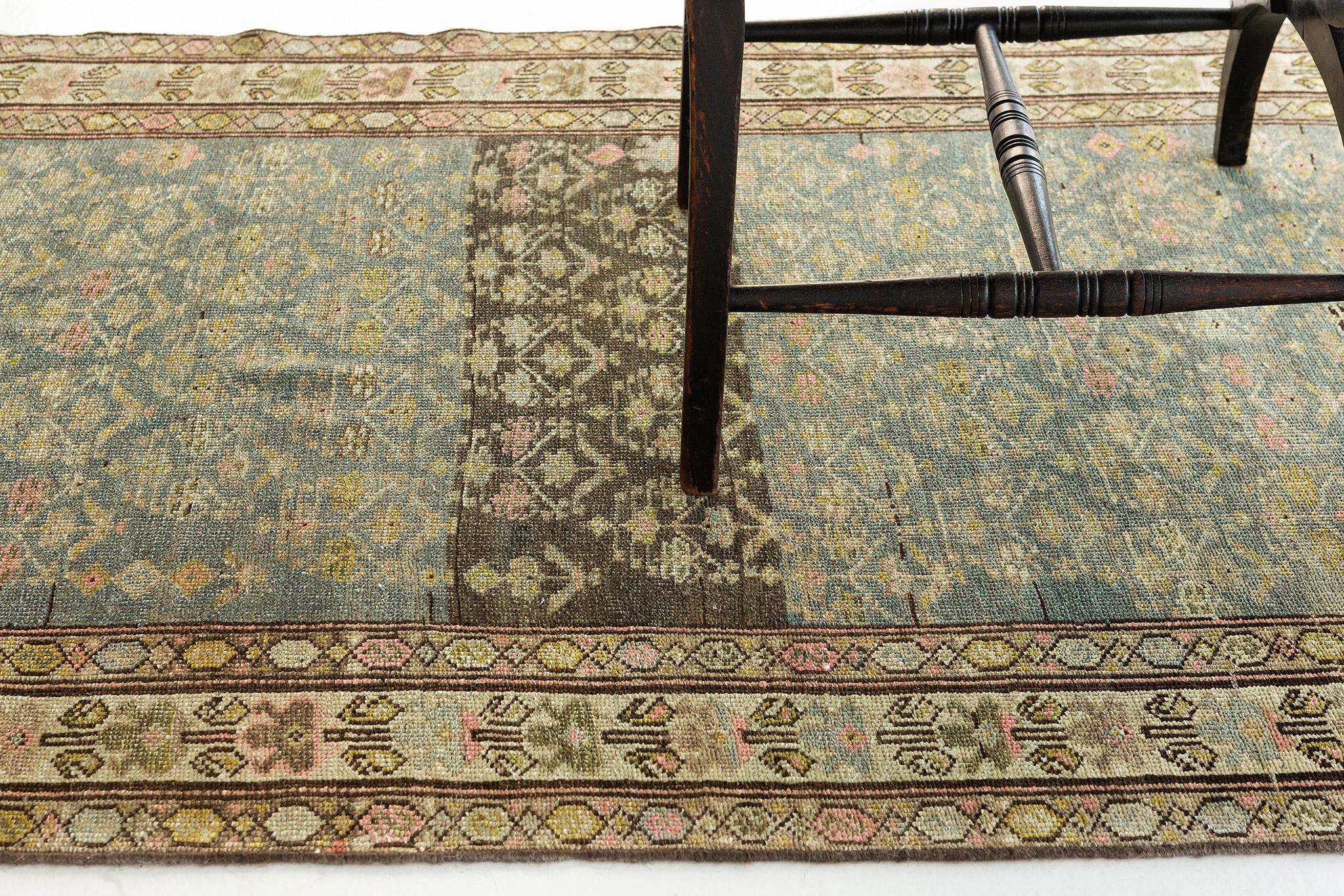 It is extraordinary something so rich in history and design blends so seamlessly into nearly any décor, even the most minimalist style. Featuring an elaborate repetitive design, this cleverly composed antique Malayer runner delivers a mesmerizing