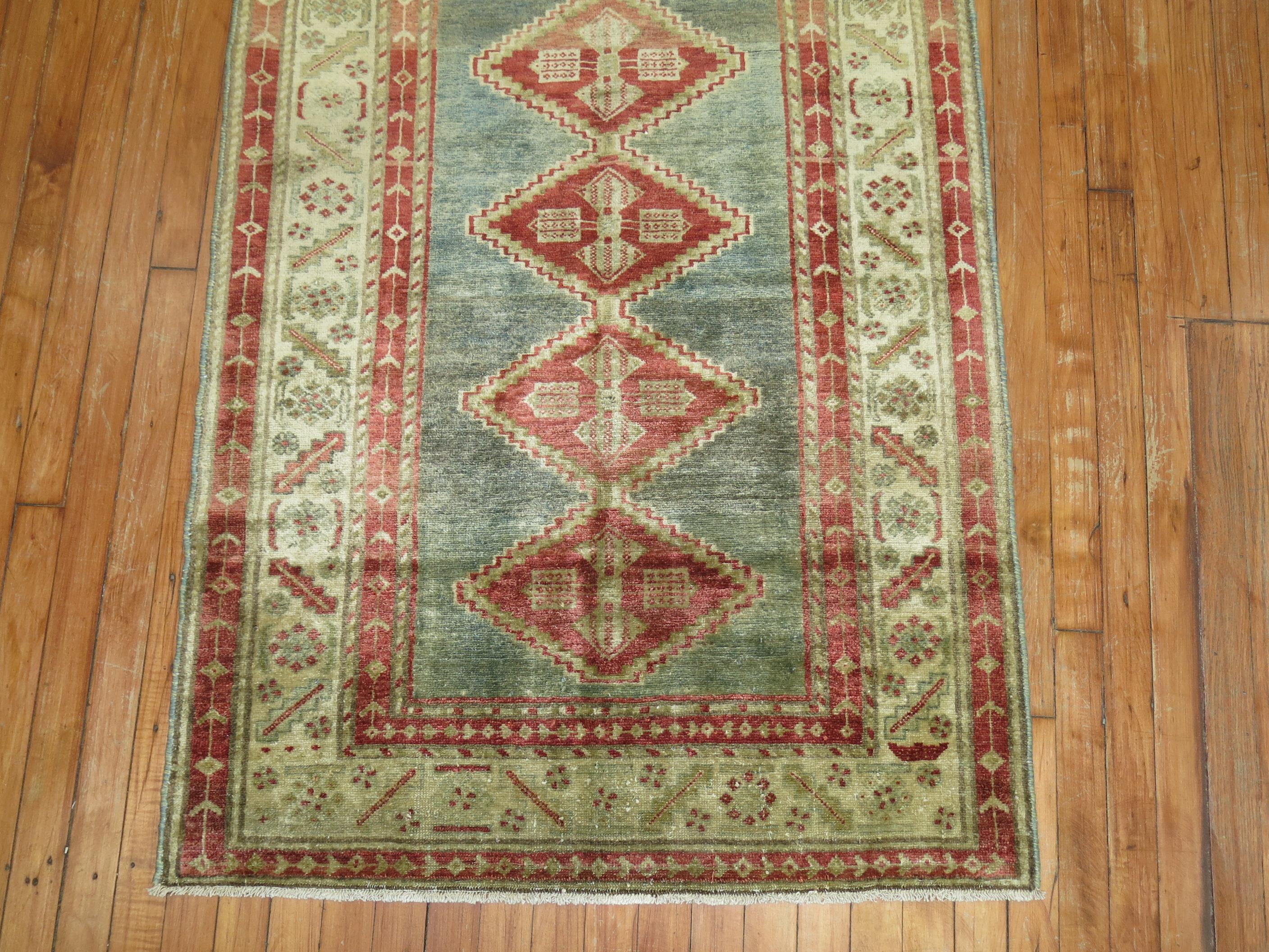 Early 20th century geometric Persian Malayer runner.

