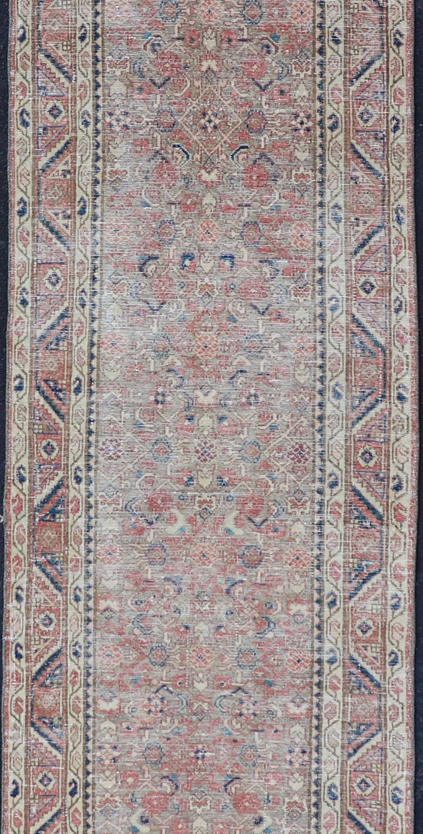Long Persian Malayer runner with small pattern in all-over design. Fine Persian Malayer Runner in soft tones of blue, salmon, cream, and earthy tones. Antique Persian rug with sub geometric and sub floral motifs. Keivan Woven Arts / rug
