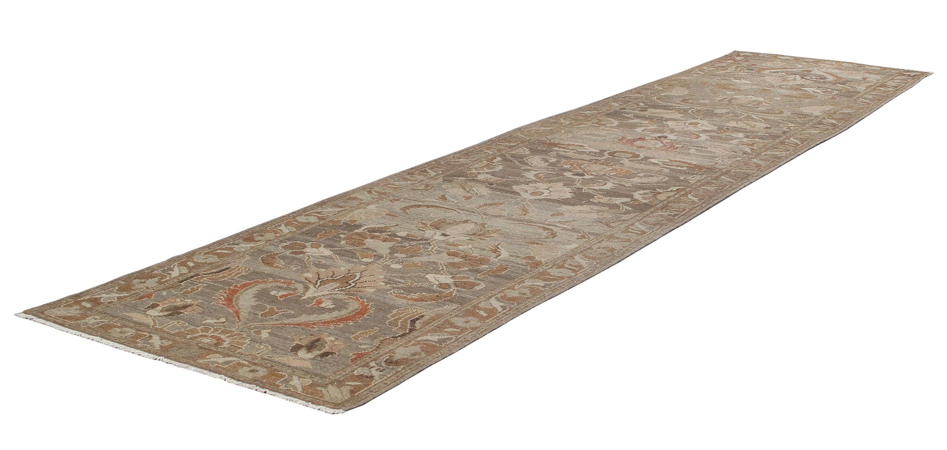 This antique Malayer runner is skillfully sourced by N A S I R I. Malayer rugs are named after a major rug-weaving village in central west Iran. The village was known for producing extremely fine rugs in the 19th century. These rugs are