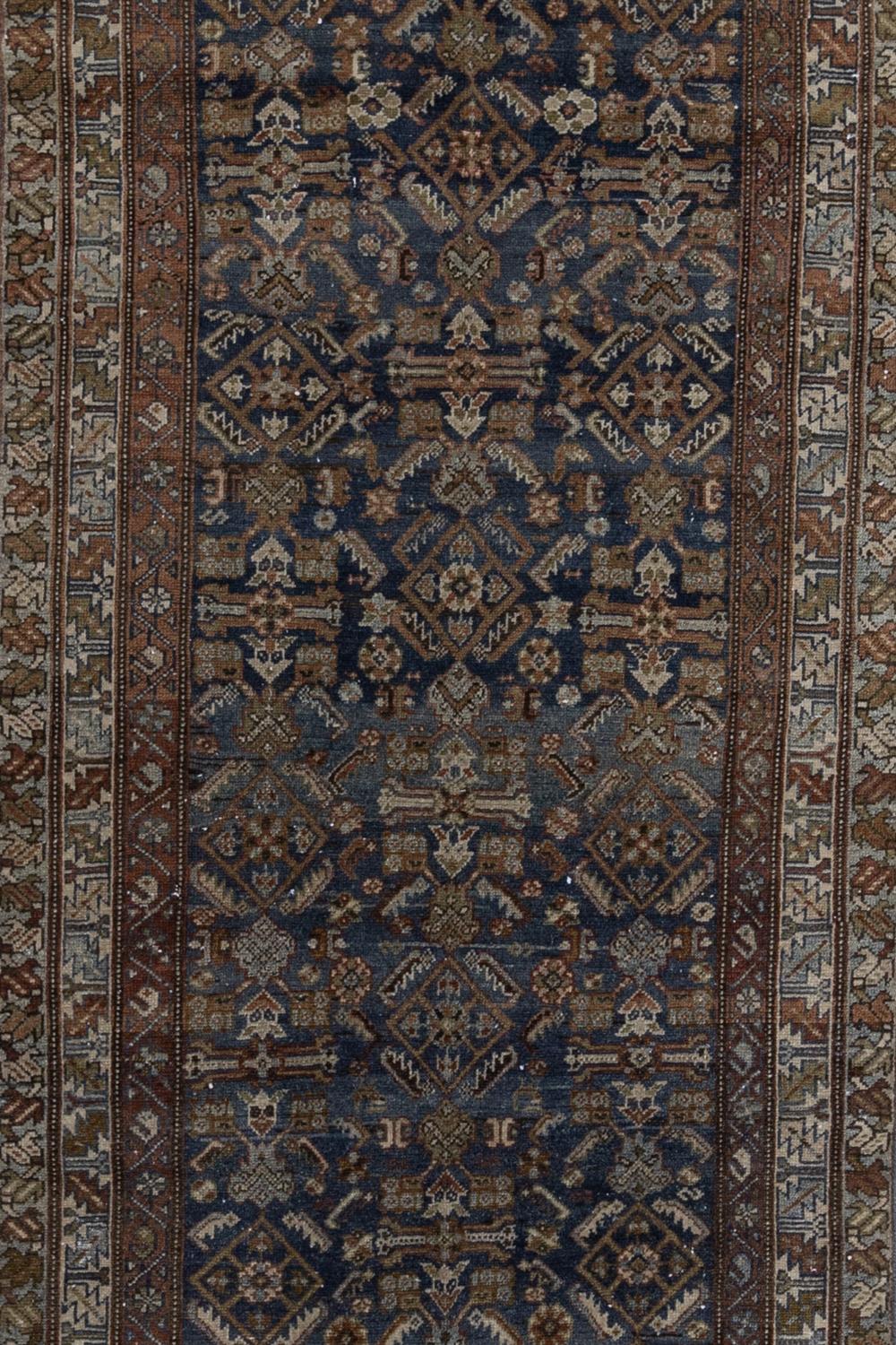 Age: early 20th century 

Pile: Low-medium 

Wear Notes: 1

Material: Wool on Cotton

Excellent condition antique Malayer with the highly sought after herati pattern on a blue field. Light antique wash for desirable color. 

Wear