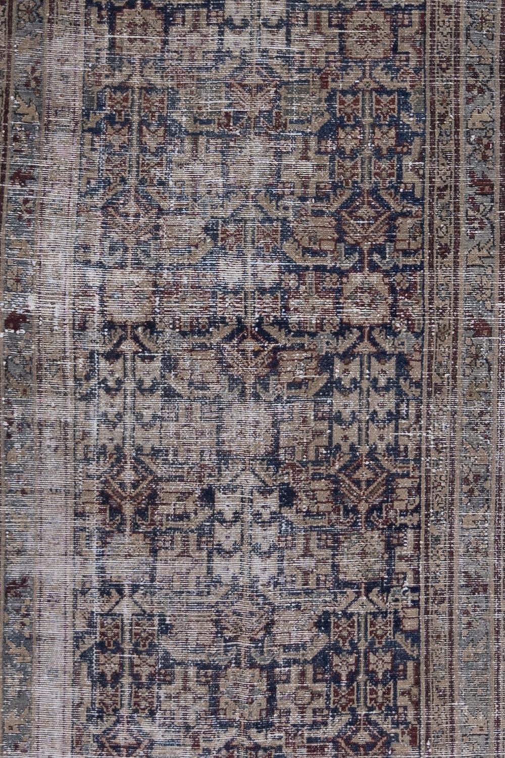 Age: early 20th century

Colors: light gray, stone, midnight blue, mushroom, brown, oxblood, baby blue

Pile: low

Wear Notes: 7

Material: wool on cotton

Moody and deep, this midnight blue runner has an alluring and mysterious quality to