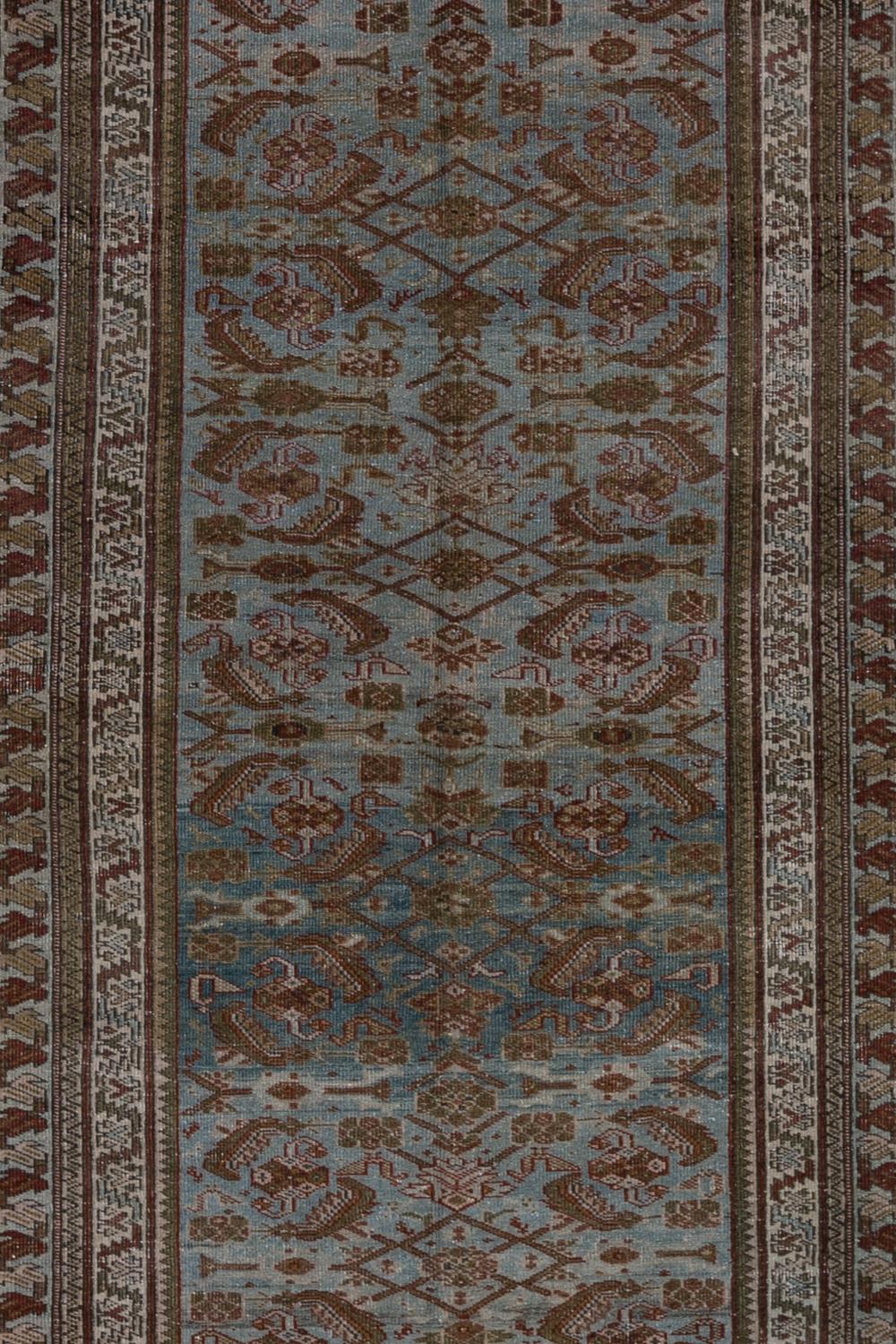 Age: early 20th century 

Pile: Low-medium (soft underfoot)

Wear Notes: 0-1

Material: Wool on Cotton

Vintage rugs are made by hand over the course of months, sometimes years. Their imperfections and wear are evidence of the hard working