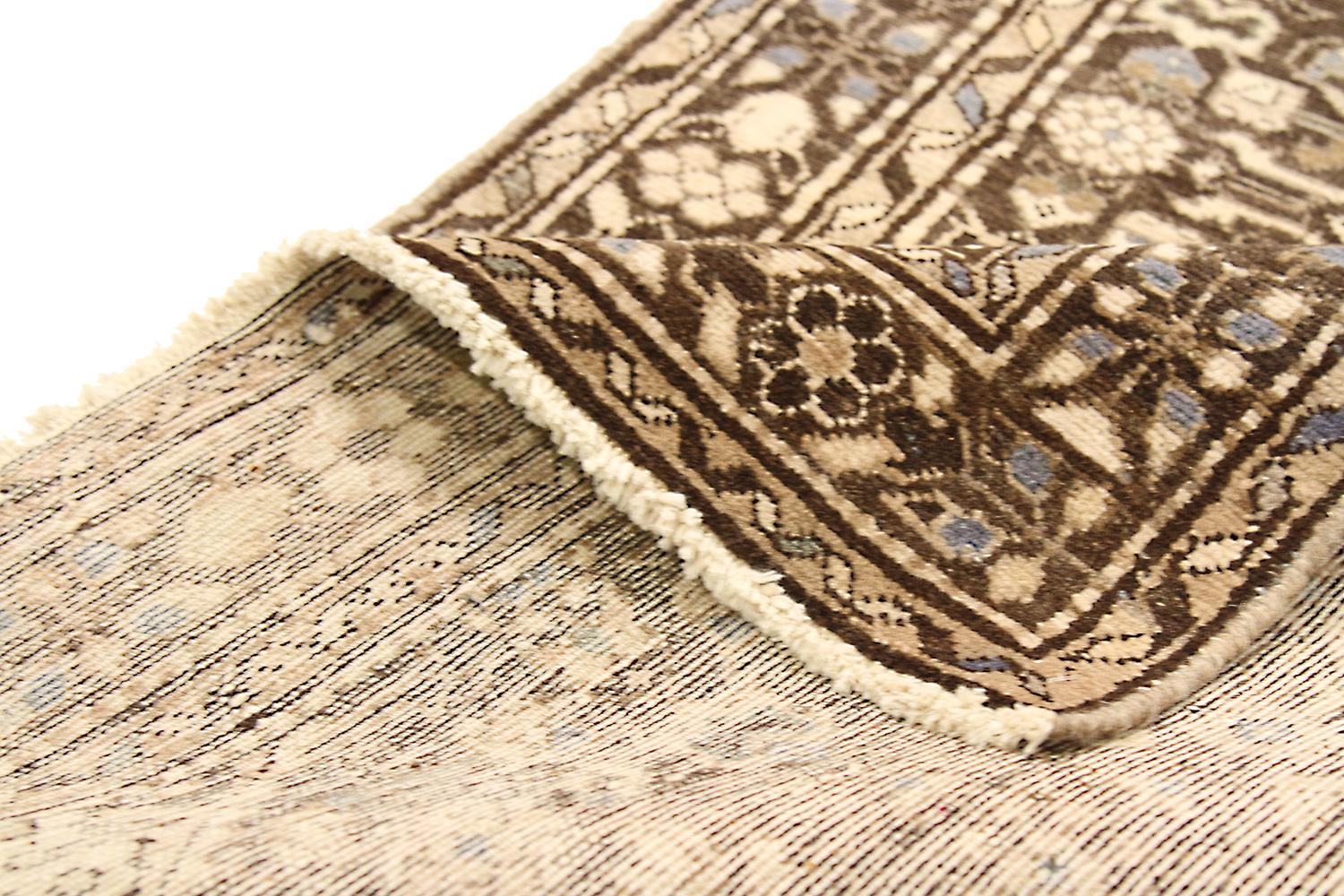 Hand-Woven Antique Persian Malayer Runner Rug with Black and Beige Flower Medallions For Sale