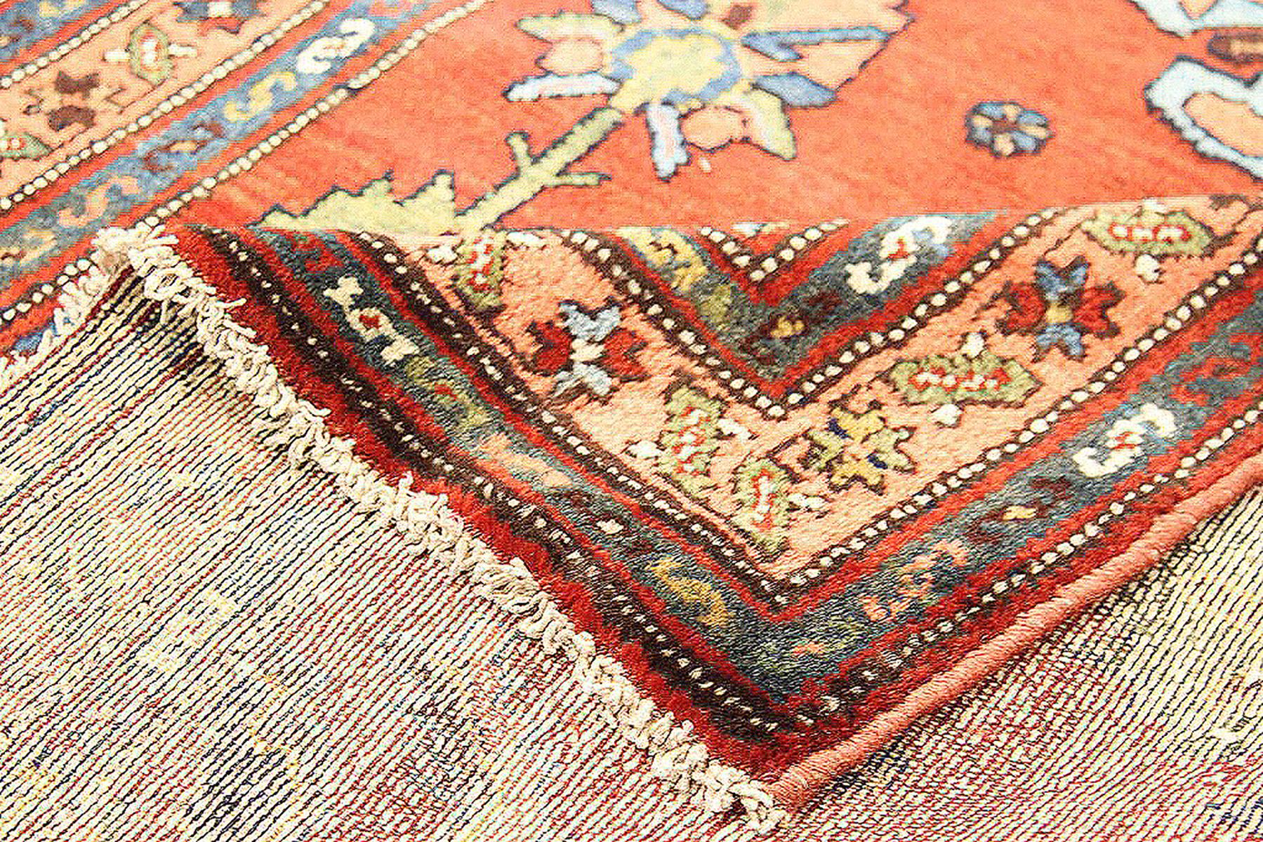 Hand-Woven Antique Persian Malayer Runner Rug with Blue & Green Floral Details on Red Field For Sale