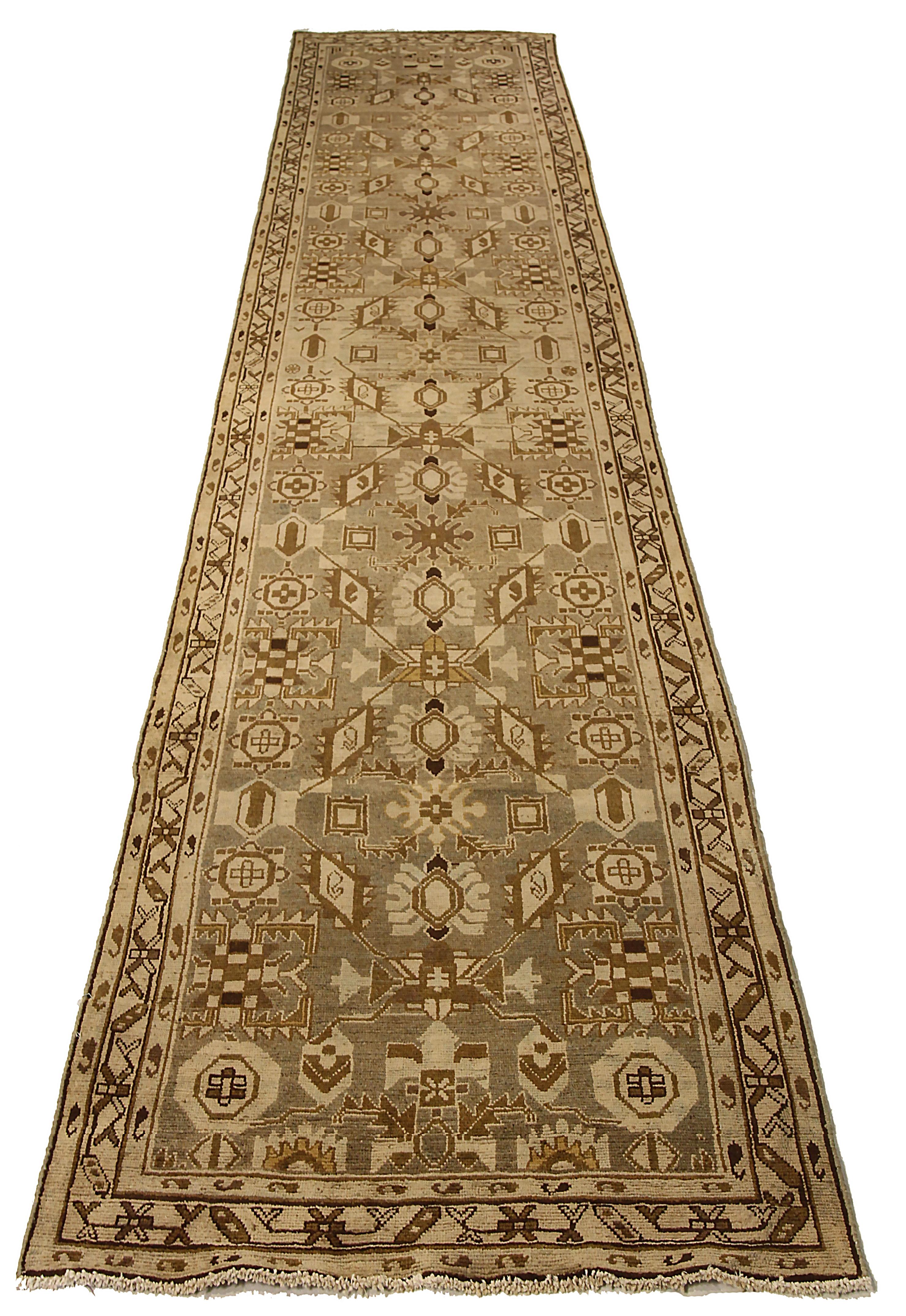 Antique Persian runner rug handwoven from the finest sheep’s wool. It’s colored with all-natural vegetable dyes that are safe for humans and pets. It’s a traditional Malayer design featuring geometric design on a beige field. It’s a lovely piece to