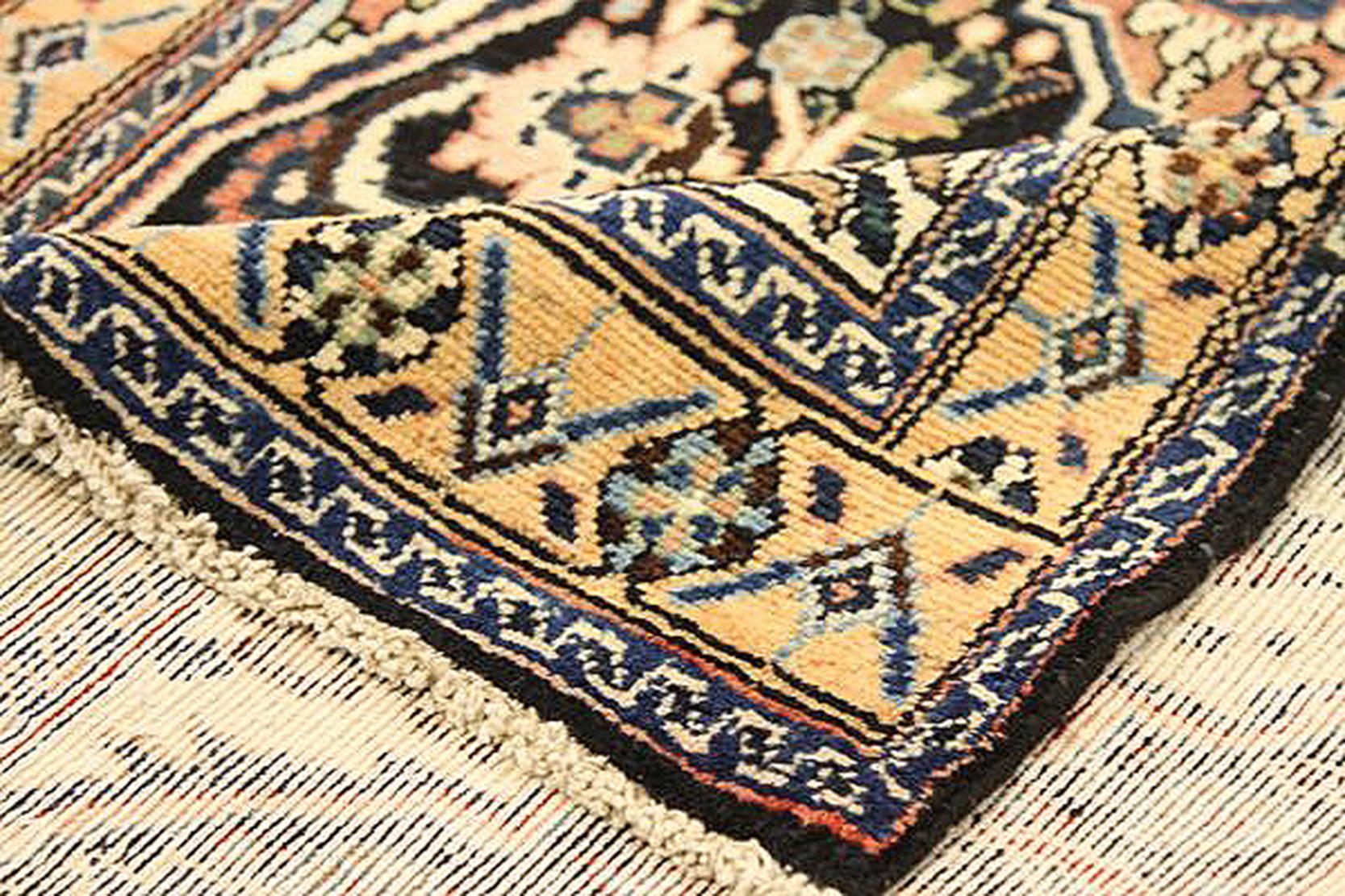 Hand-Woven Antique Persian Malayer Runner Rug with Red and Blue Floral Details All-Over For Sale