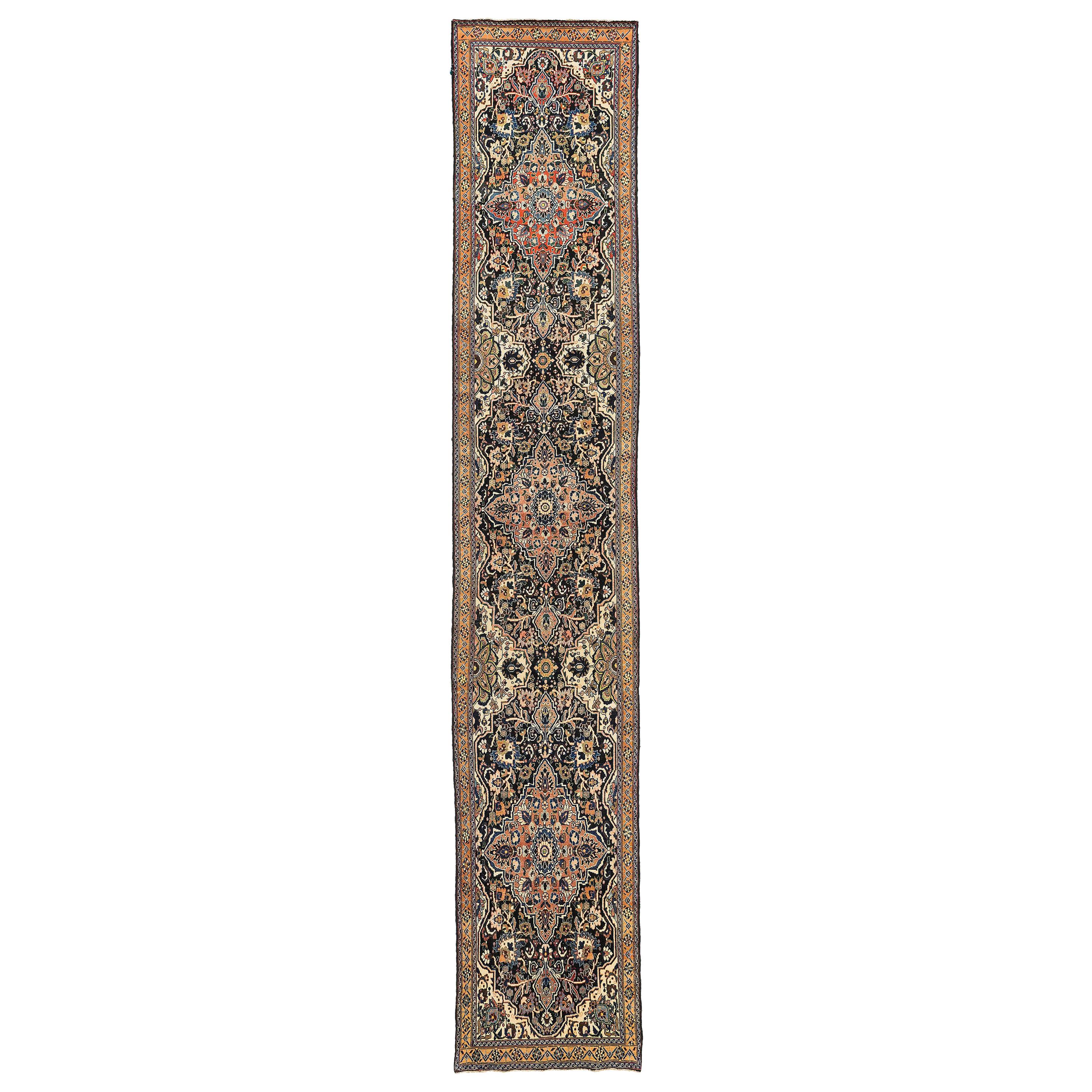 Antique Persian Malayer Runner Rug with Red and Blue Floral Details All-Over For Sale