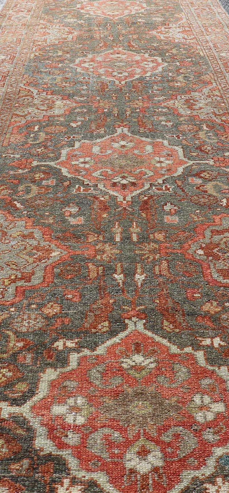 20th Century Antique Persian Malayer Runner with All-Over Floral Medallions Design